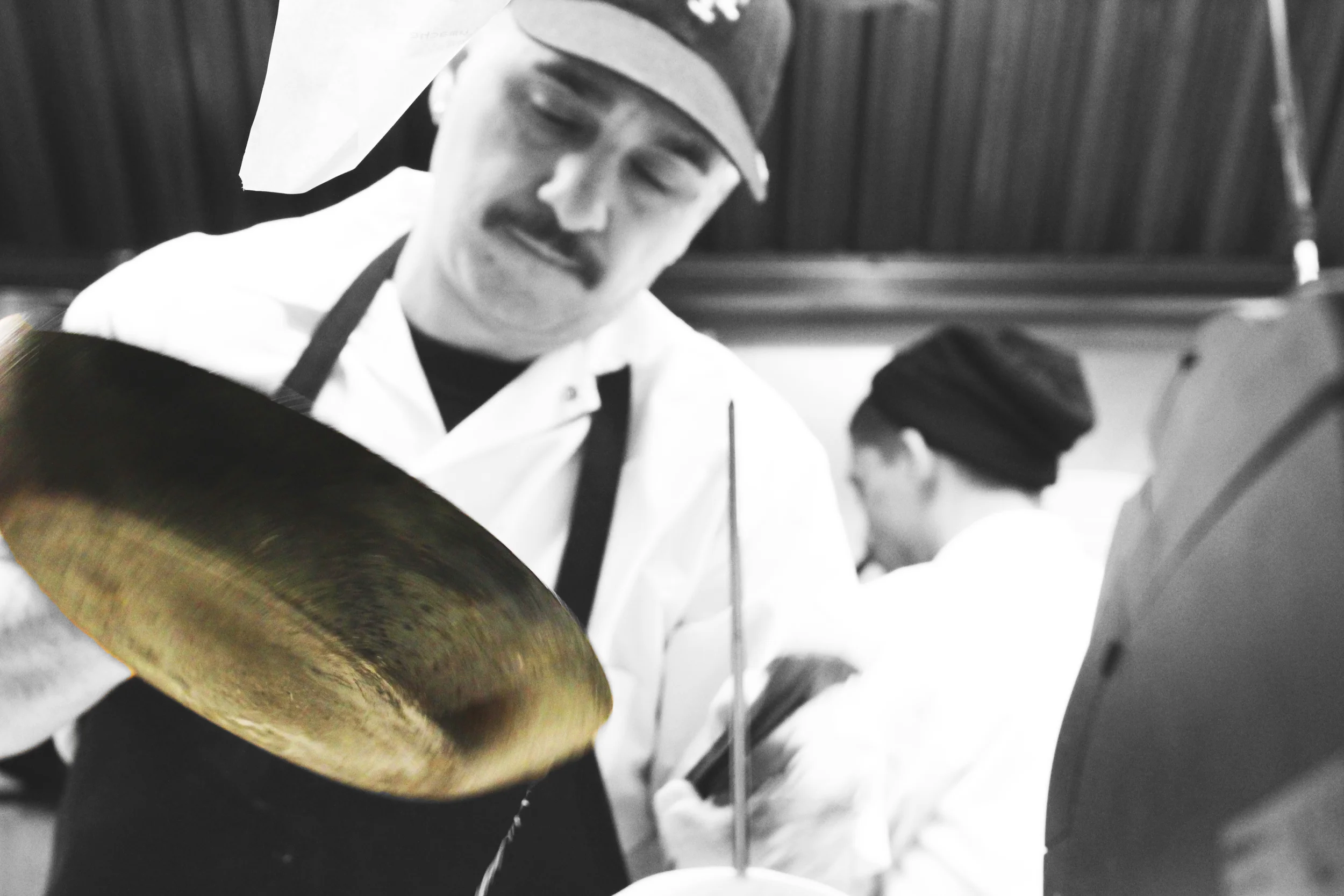 Chef Chris Pizzulli holding a saute pan