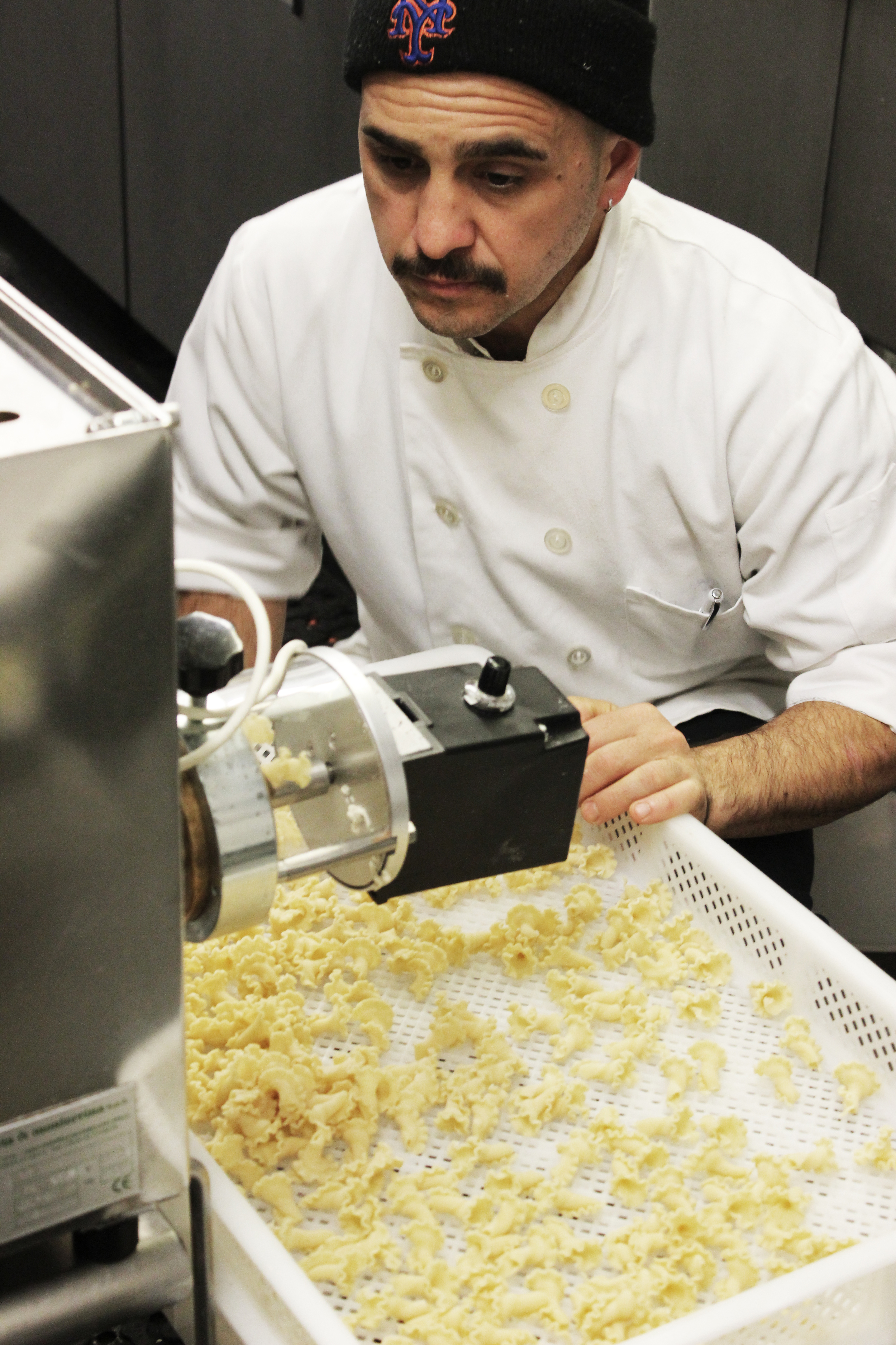 Chef chris pizzulli making fresh extruded pasta