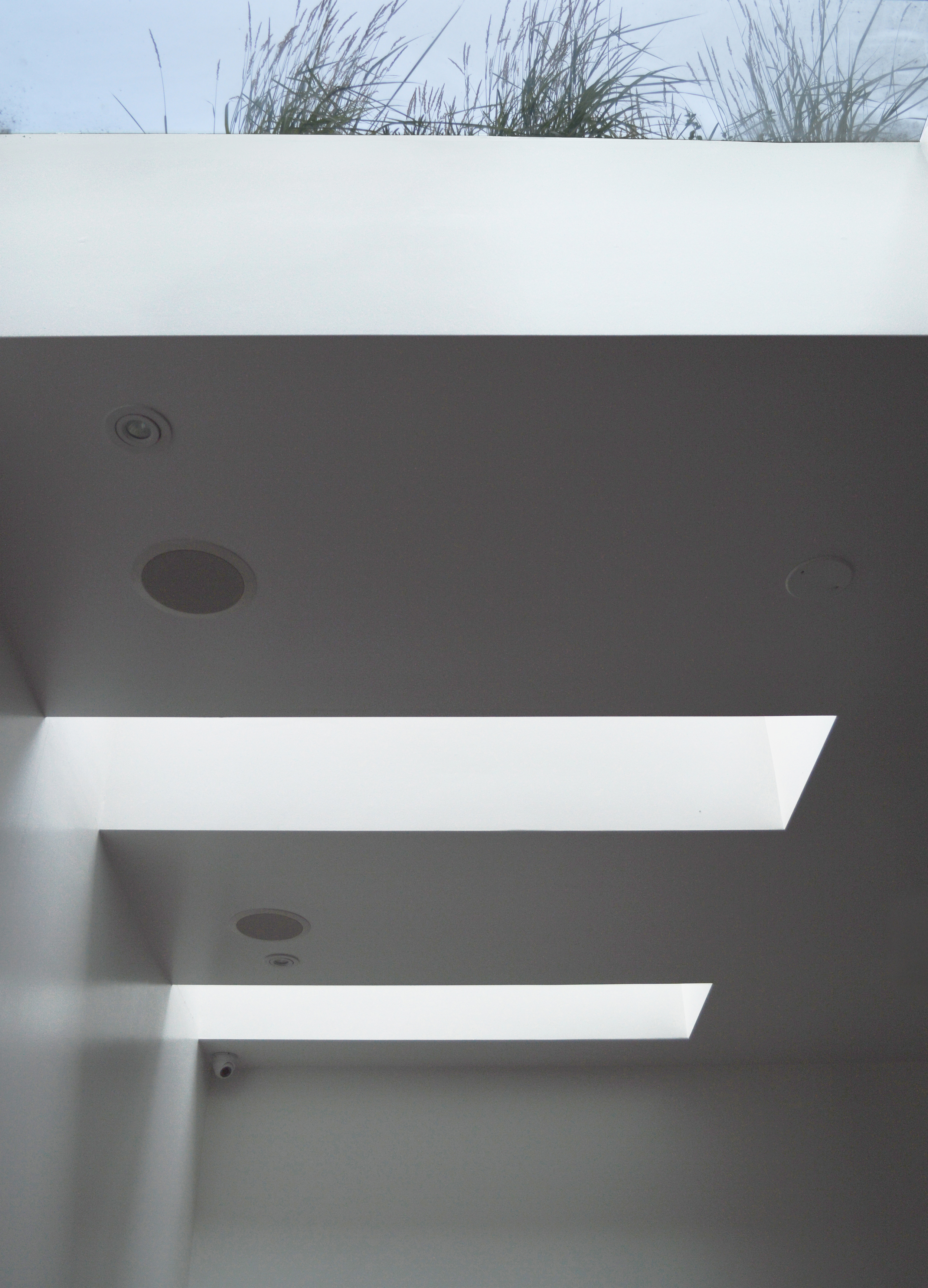 light entering skylights in the mezzanine level of runner and stone