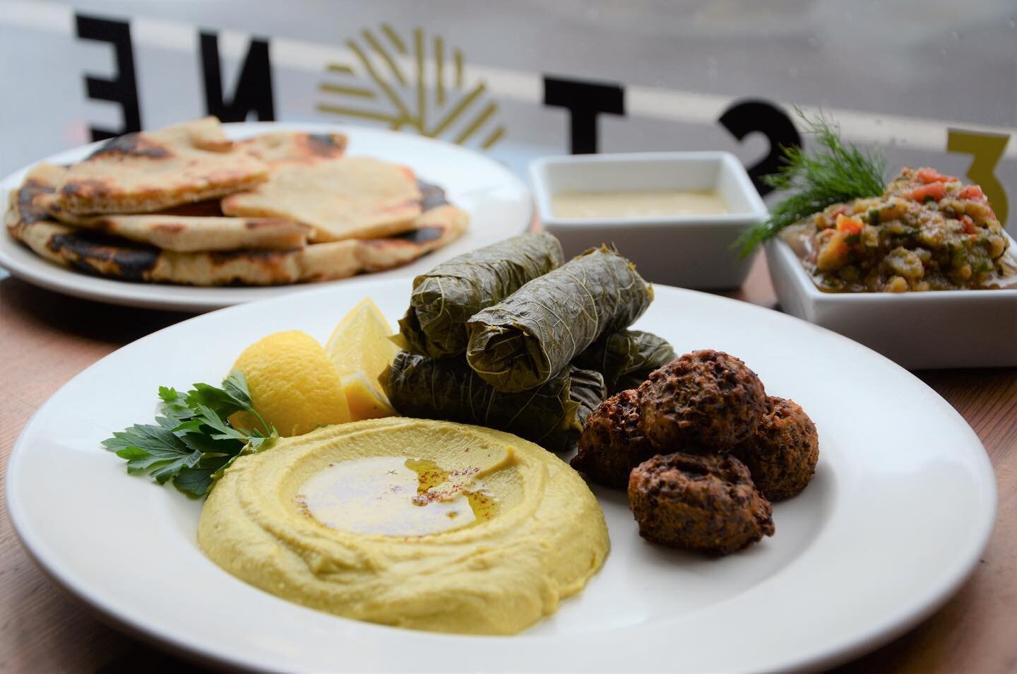 wondering what&rsquo;s for dinner and/or what day of the week it is? 🤔🍽🗓 ⁣⁣
⁣⁣
check out our daily set specials for two:⁣⁣
⁣⁣
(meatless) m o n d a y⁣⁣
mediterranean platter w. house pita, roasted tomato &amp; eggplant salad 🌱 ⁣⁣
⁣⁣
t u e s d a y 