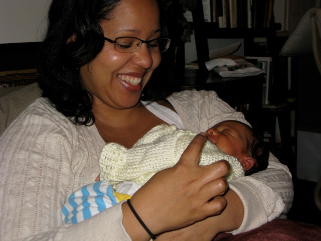 Grace with baby Amaya, 2010.