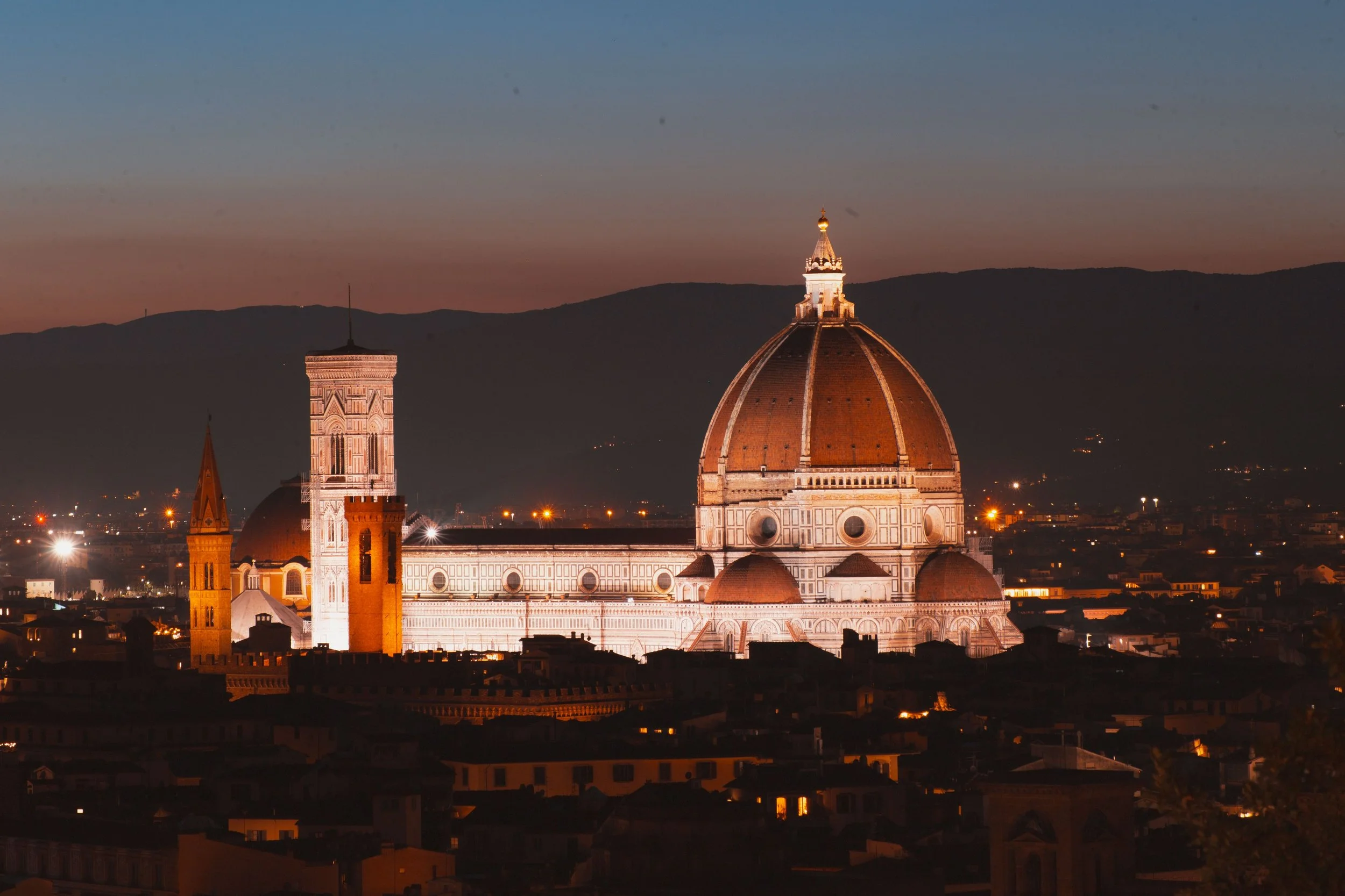 View of Florence’s historic rooftops and architecture in the evening light