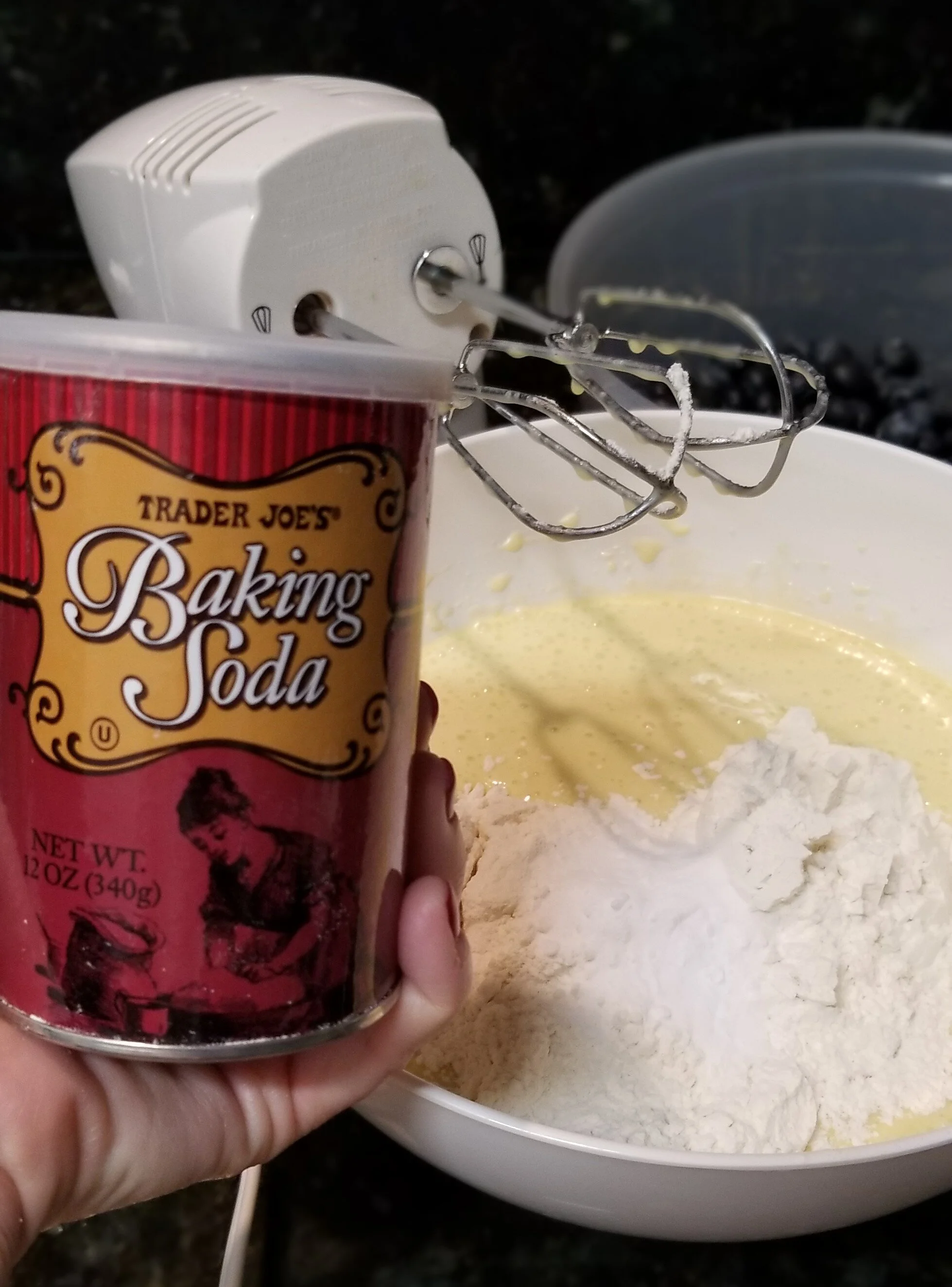Adding baking soda to a cake mix with an electric mixer