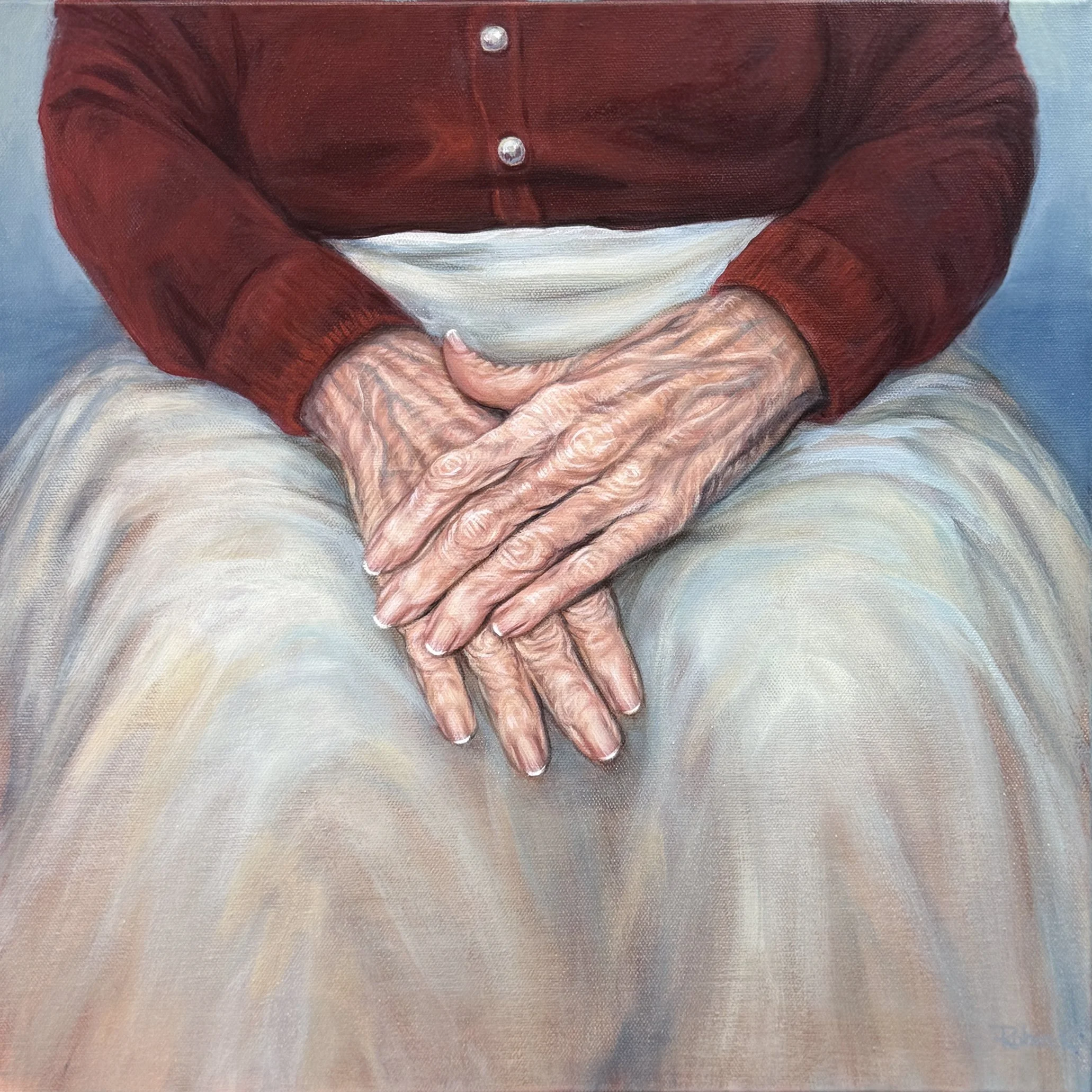 Grandma's hands painting on canvas