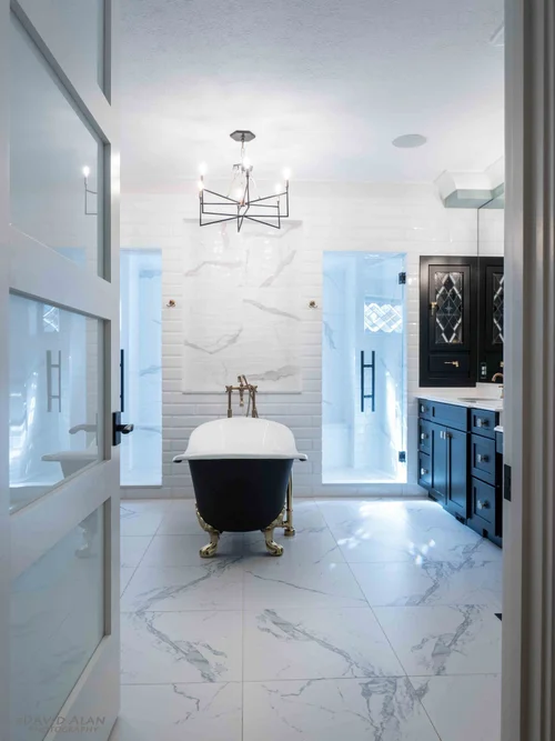 Freestanding tub and tile finishes in a Perrino bathroom