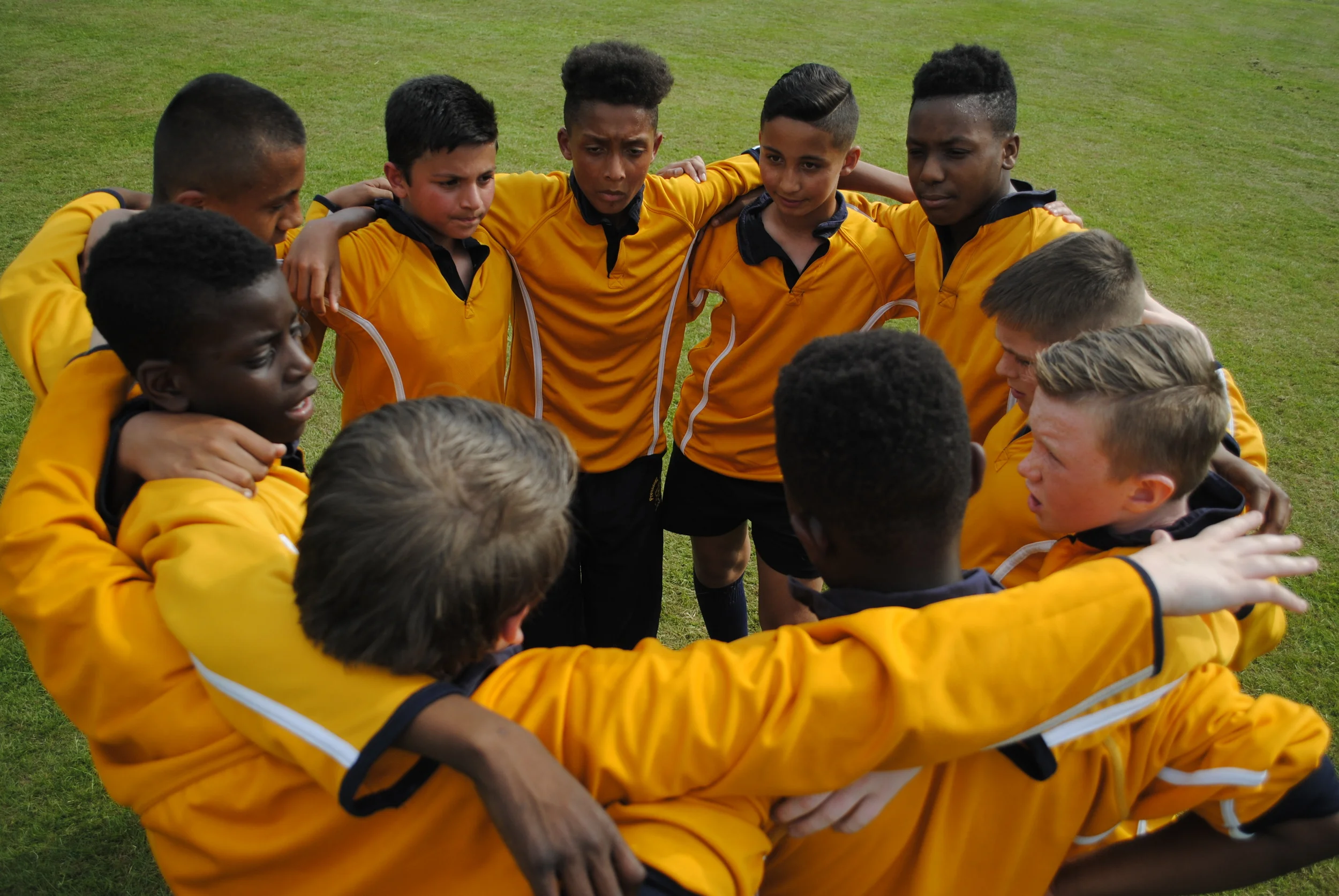 President Kennedy players get themselves fired up for the second half