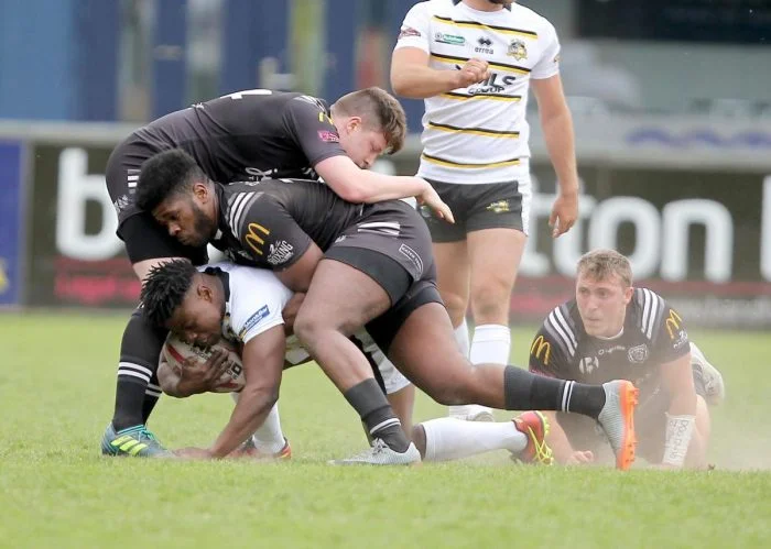 Kam Pearce-Paul tackles York's Judah Mazive.jpg