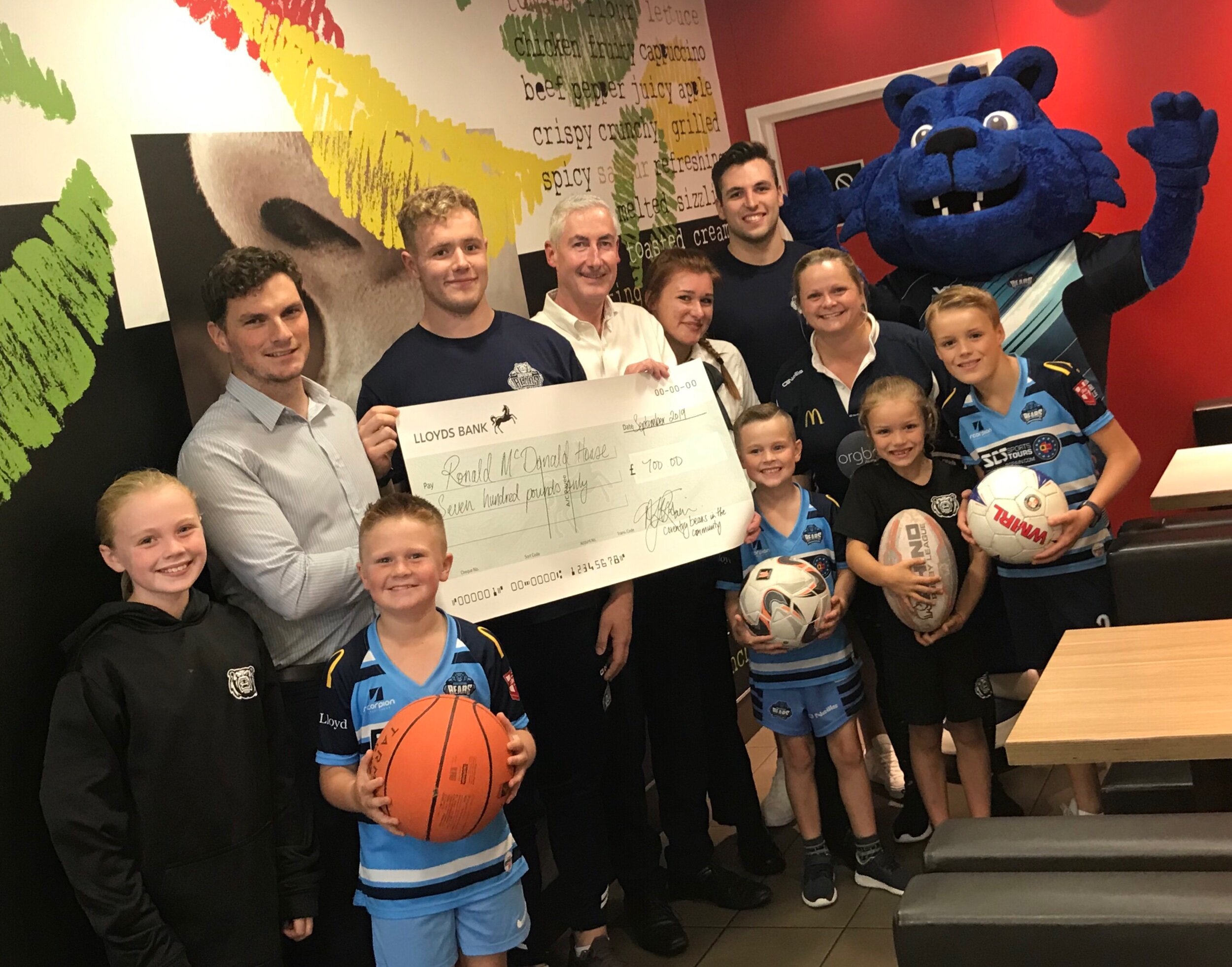 Celebrating the summer camp success with some of the youngsters who took part with Cormac Whelan, Peter Ryan, John Kiely, Elizabet Plepsis, Aaron Ryan, Debbie Watson and Big Blue.