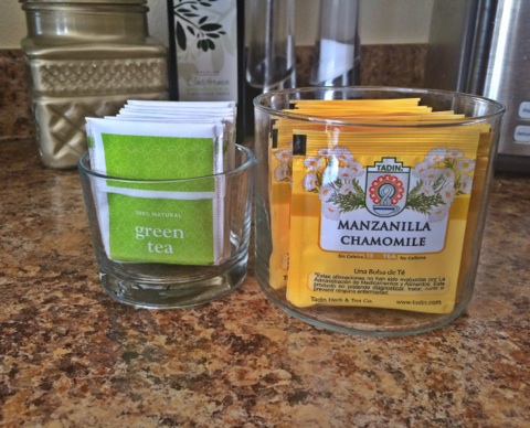 TEA CONTAINERS, LOOKS WAY MORE ORGANIZED THAN A BUNCH OF BOXES IN THE PANTRY