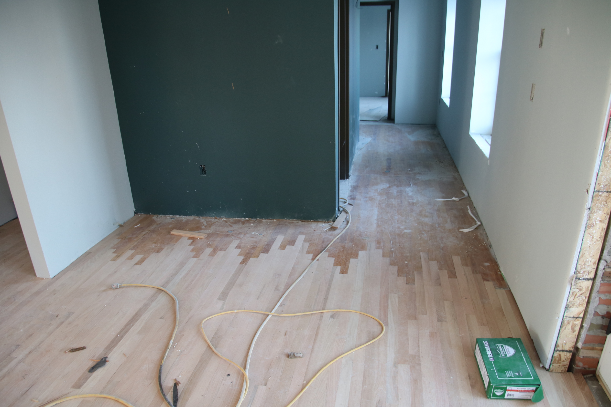 2016-01-19 hardwood flooring lacing in Entry.JPG