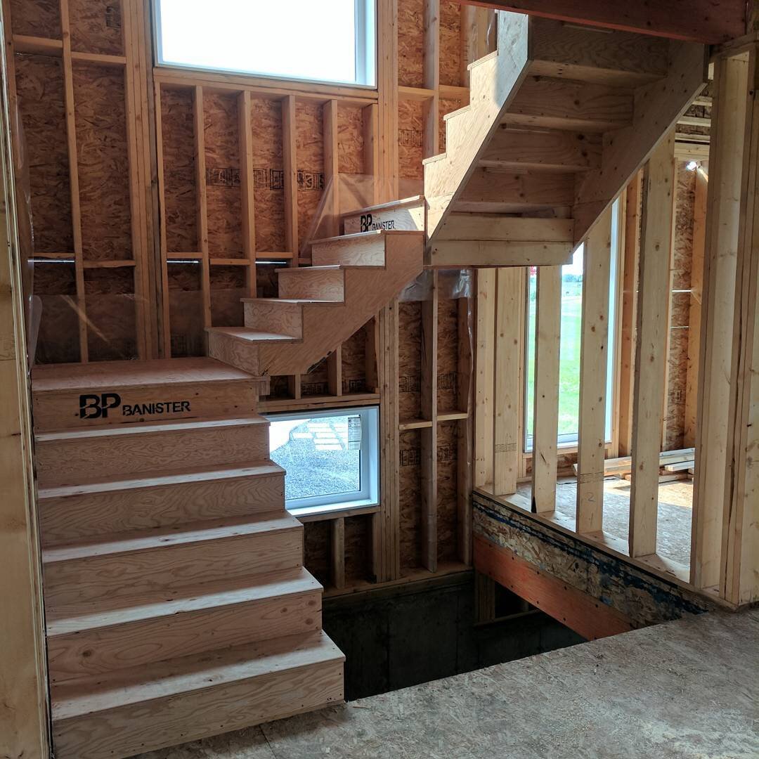 Have you ever wanted to eliminate support posts under landings?... With attached landings you can!! Come talk to us if you have any custom stair needs. We will be happy to help! #bpbanister #constructiongradestairs #stairs #railing #saskatoon #saskat