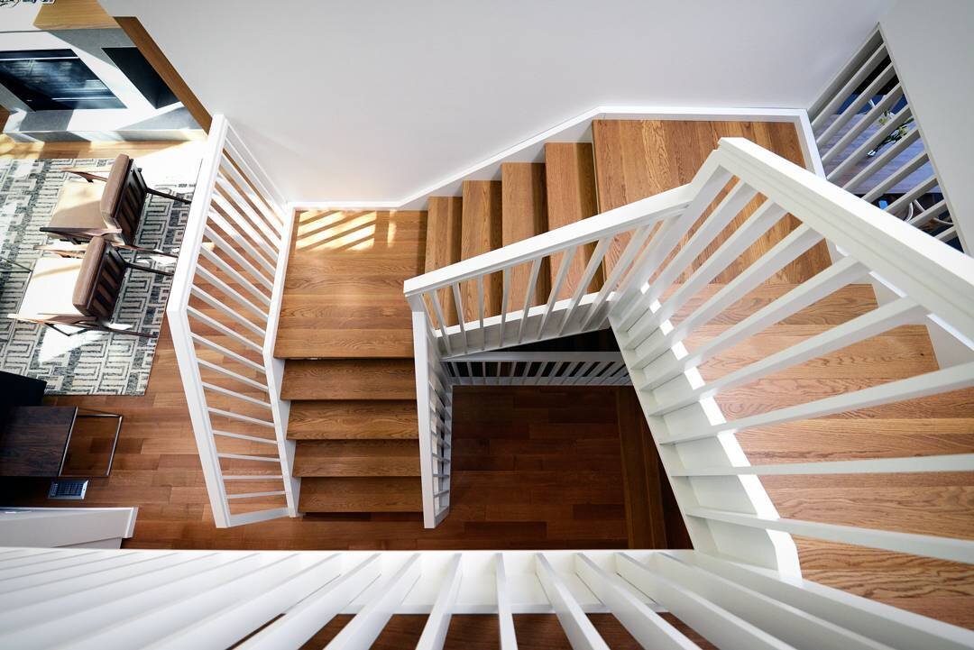 Yet another custom stair for the amazing @havenbuilders in collaboration with @oxbowarch. This was a very unique design with solid White Oak treads to match the flooring and white stringers and rail system to match the paint color. Come see us if you