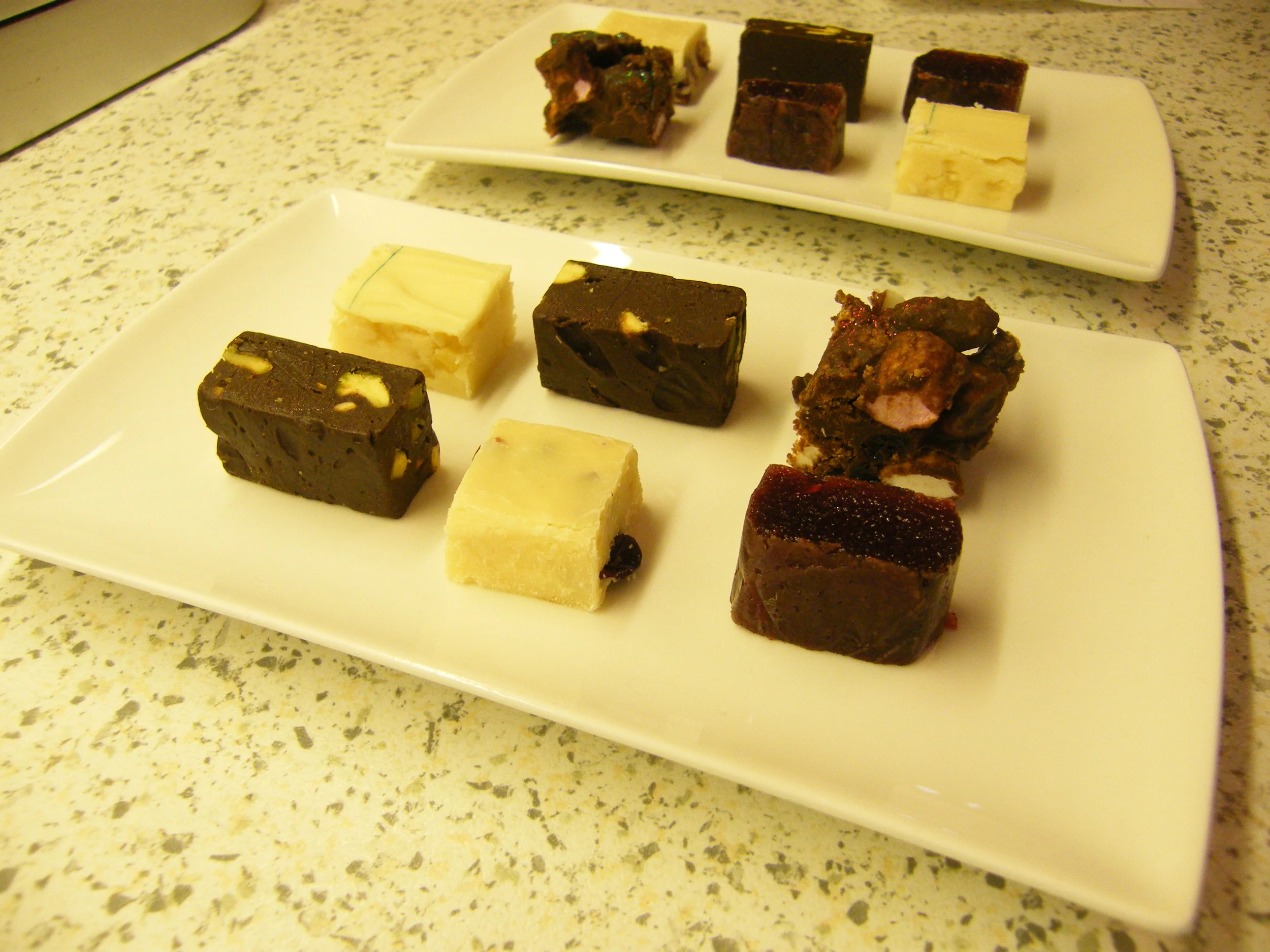 White Chocolate and Preserved Lemon Fudge, Dark Chocolate and Pistachio Fudge, Rum and Raisin Fudge, Rocky Road, Damson Cheese