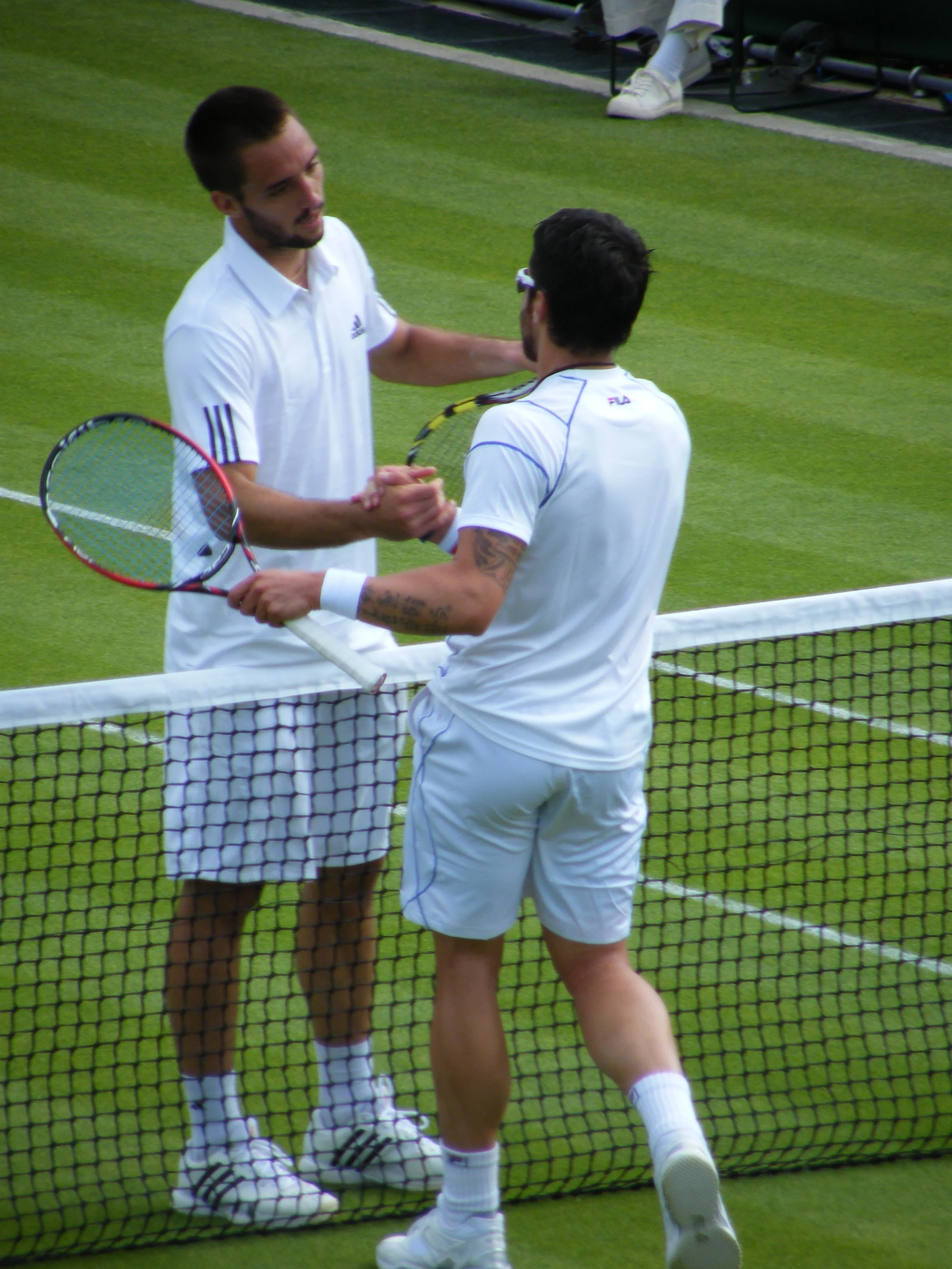 16:48 - Commiserations from Troicki, congratulations from Tipsarević... and still Serbian sidekicks.