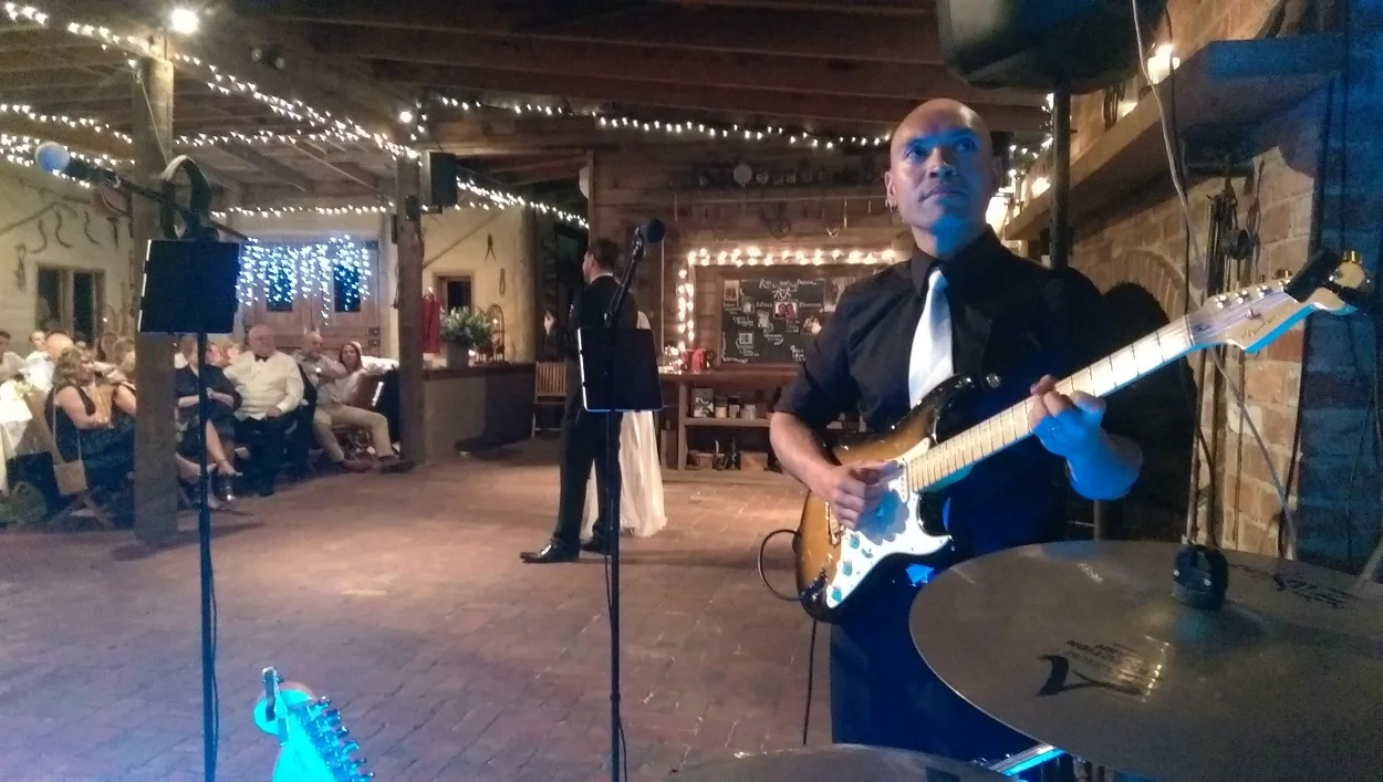 Leading singer Andrew is at the ready, waiting for the speeches to stop and the rocking to start!