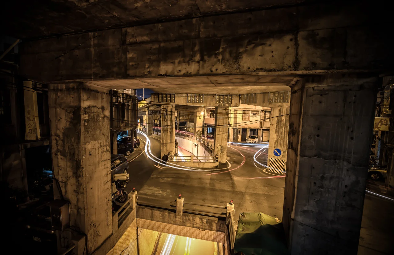 I love this area of Zhongli (中壢). There are two levels of road with an overpass above and the train tracks behind. There is always beautiful light and lots of activity!