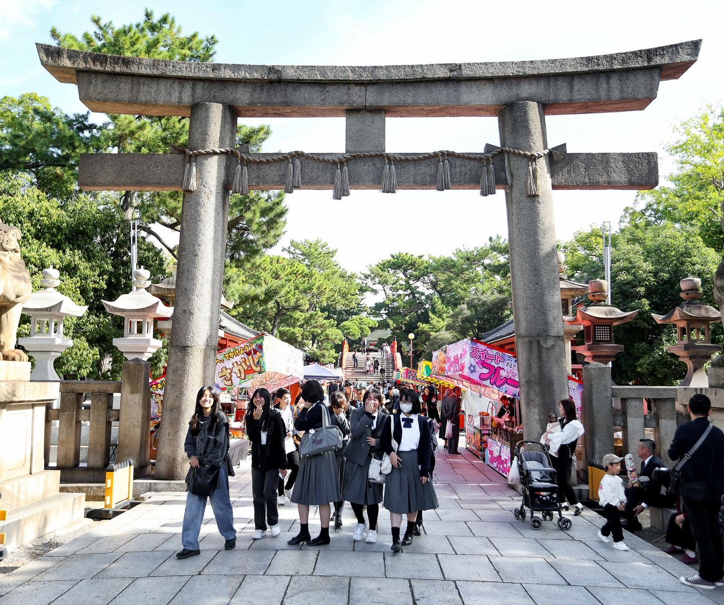 Festival-like atmosphere at the front gate of Osaka&rsquo;s Sumiyoshi Grand Shrine. It was a coming of age day for children, so they were selling lots of handmade sweets, most of which included red bean, which I find disgusting.