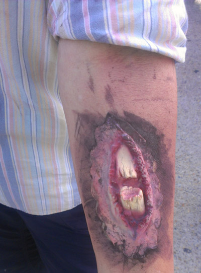 ouch! trauma moulage, like this compound fracture, makes training drills more realistic.