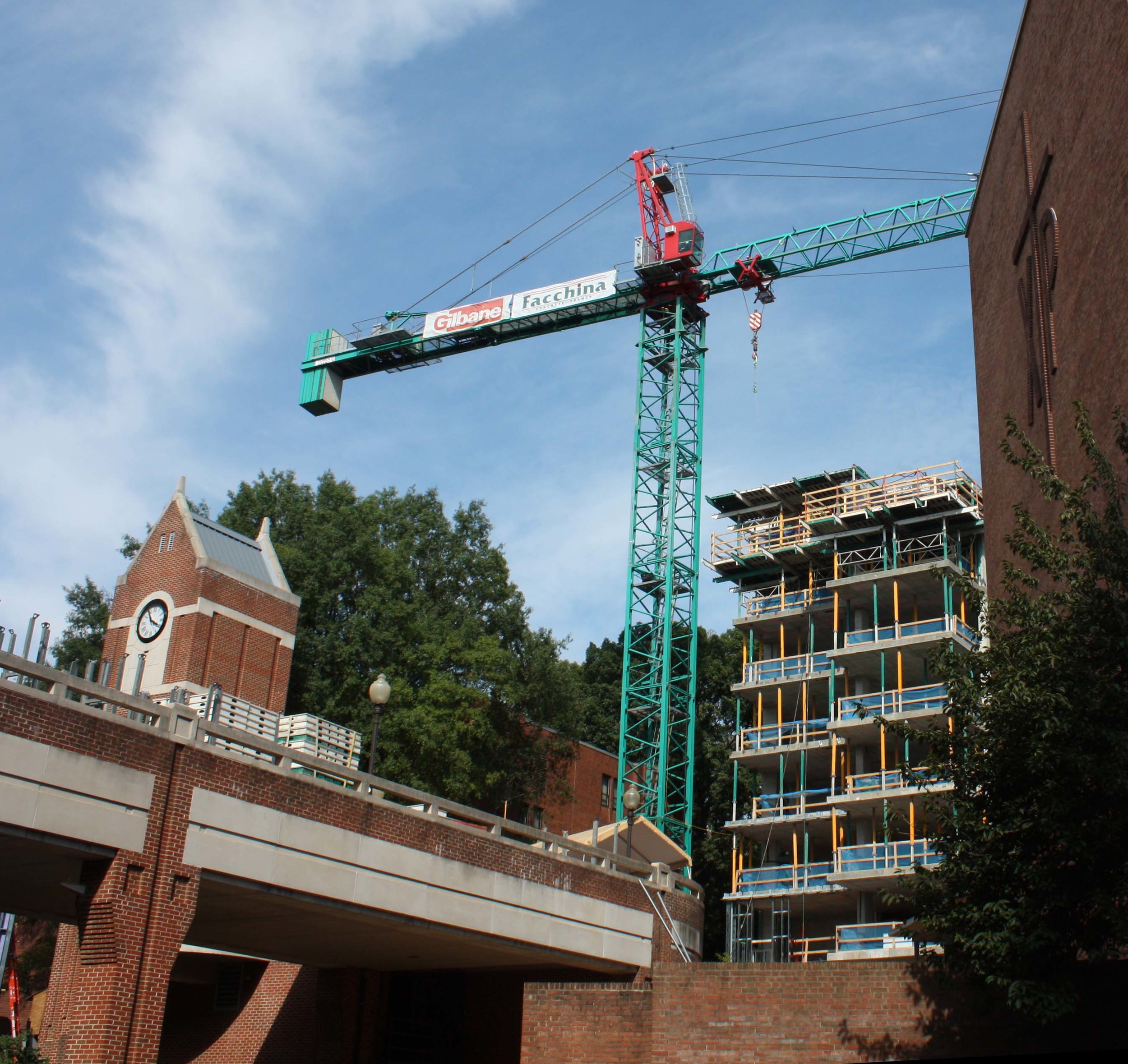 Construction cranes, such as this one at northeast triangle residence hall, loom over the campus skyline.