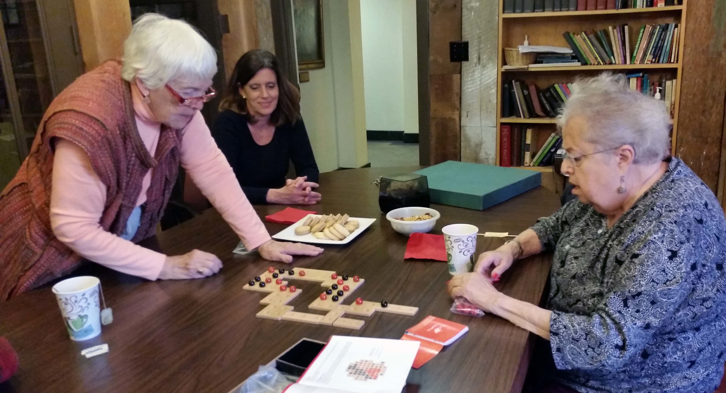 two members match wits at a round of brain games, one of the new activities introduced this year.