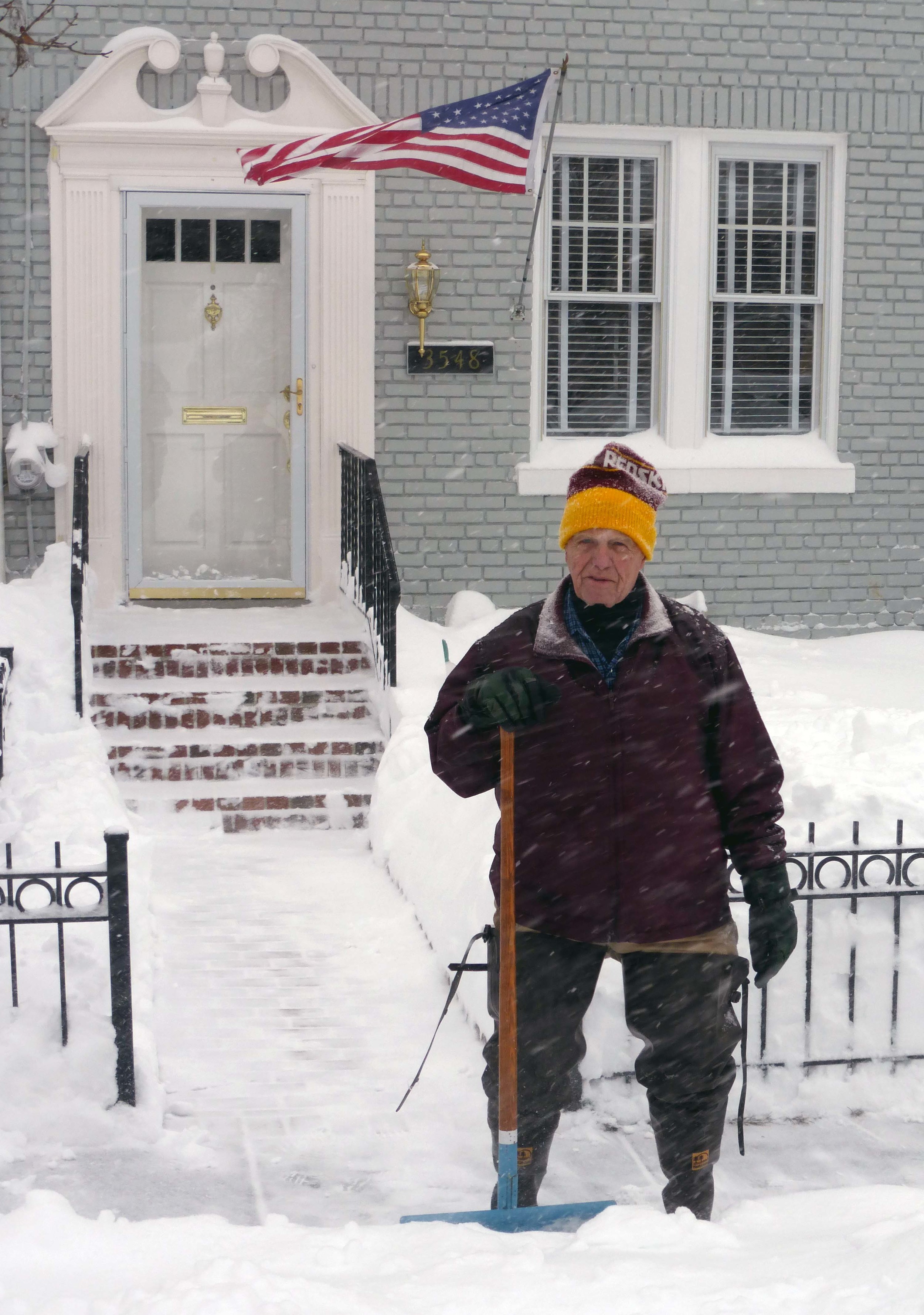Charlie Volkman does a thorough job on his walk and front sidewalk.