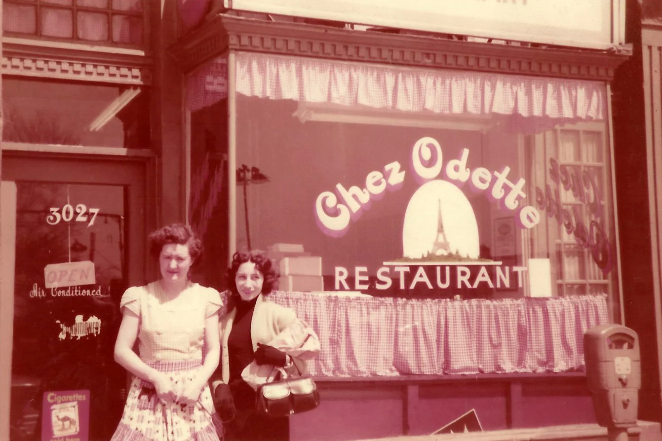 Odette Pantelich and an unidentified woman at the original location of her eponymous restaurant, 1956.