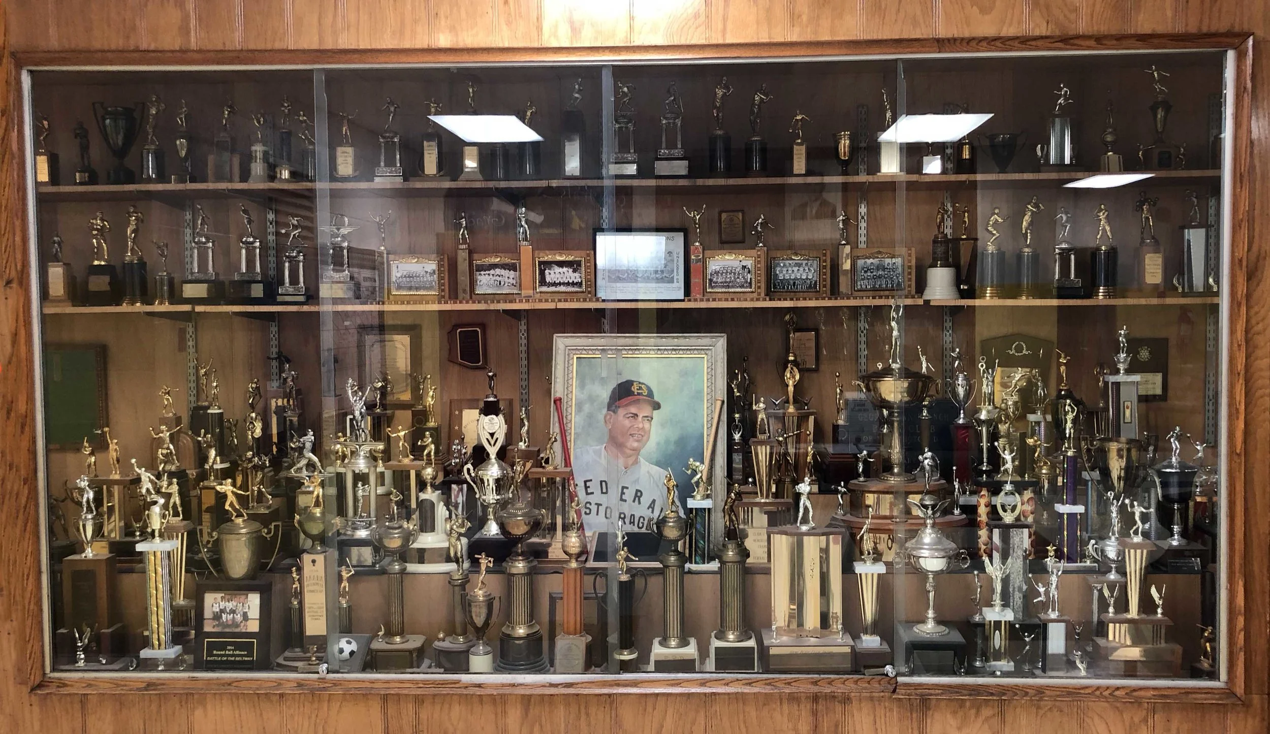Basement trophy case showcasing past glory!