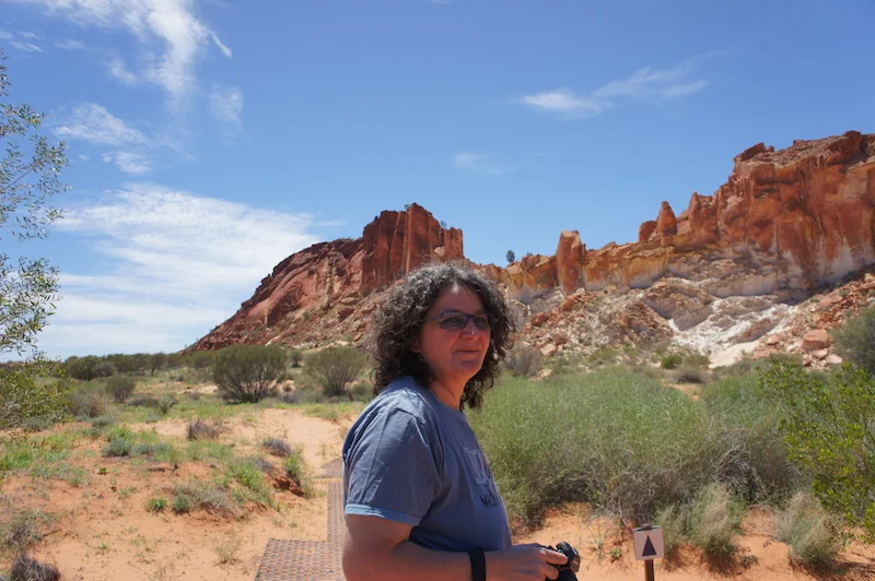 Claudia at Rainbow Valley the same January -- happy with camera in hand. Pic by author