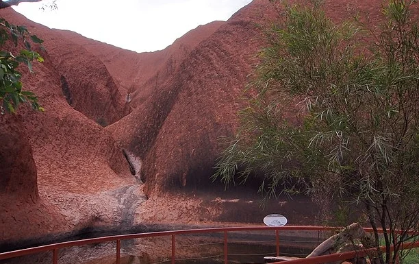 Mutitjulu waterhole -- a still, sacred place. Photo by rheins .