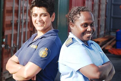 Customs Officers--fighting the fire ants. Australian Kamal Dutta (L) and Solomon Islands Officer Tammy Luitolo. DFAT photo.
