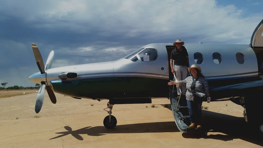 The author and Dr S arriving at Tjuntjuntjara for work. Photo ©Claudia Jocher 2019.