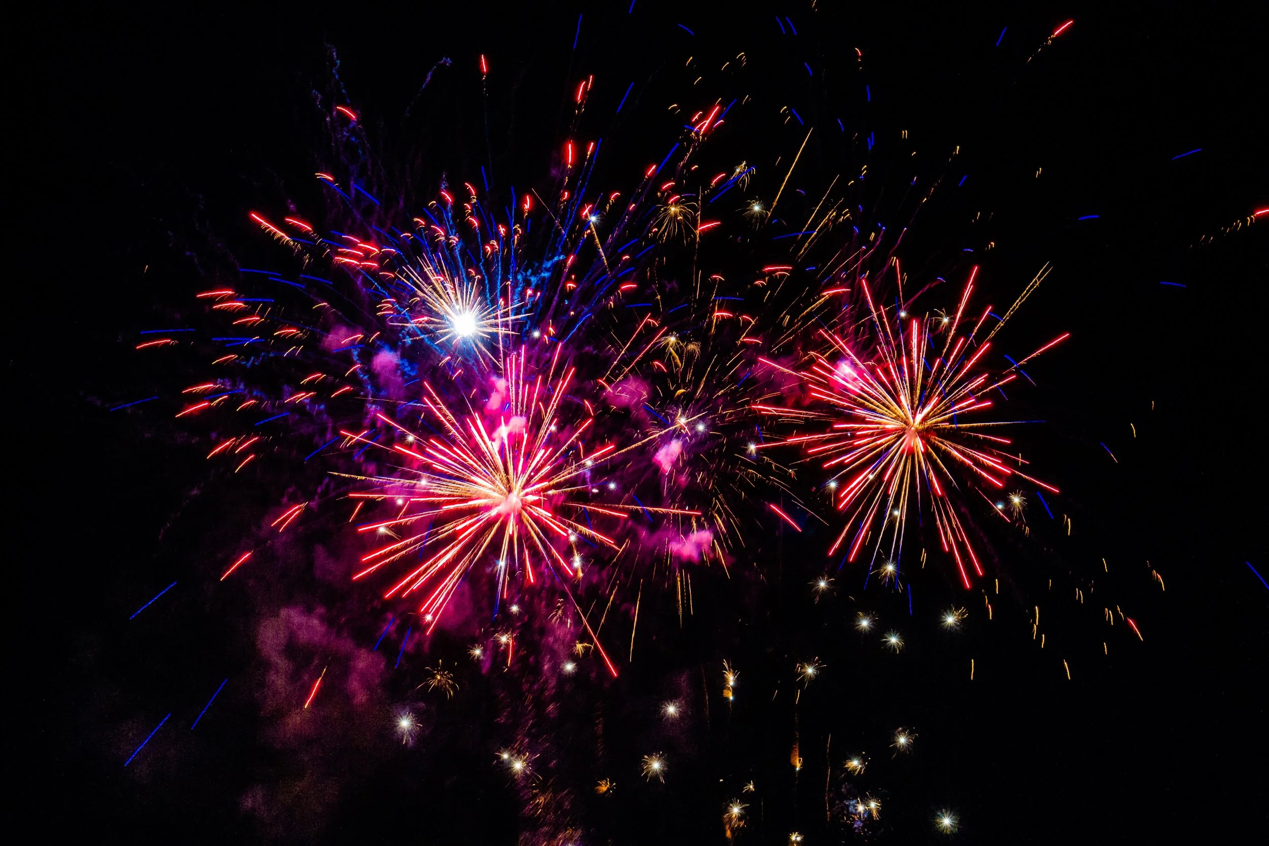 multicolored-fireworks-exploding-sky-night.jpg
