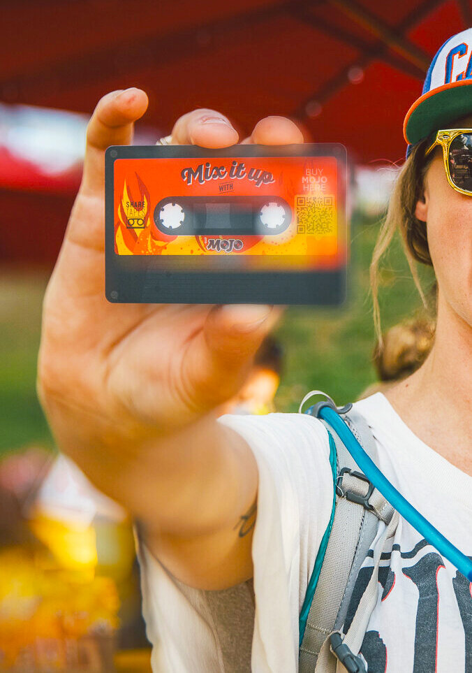  A festival goer with a Clif Mojo branded Mix tape 