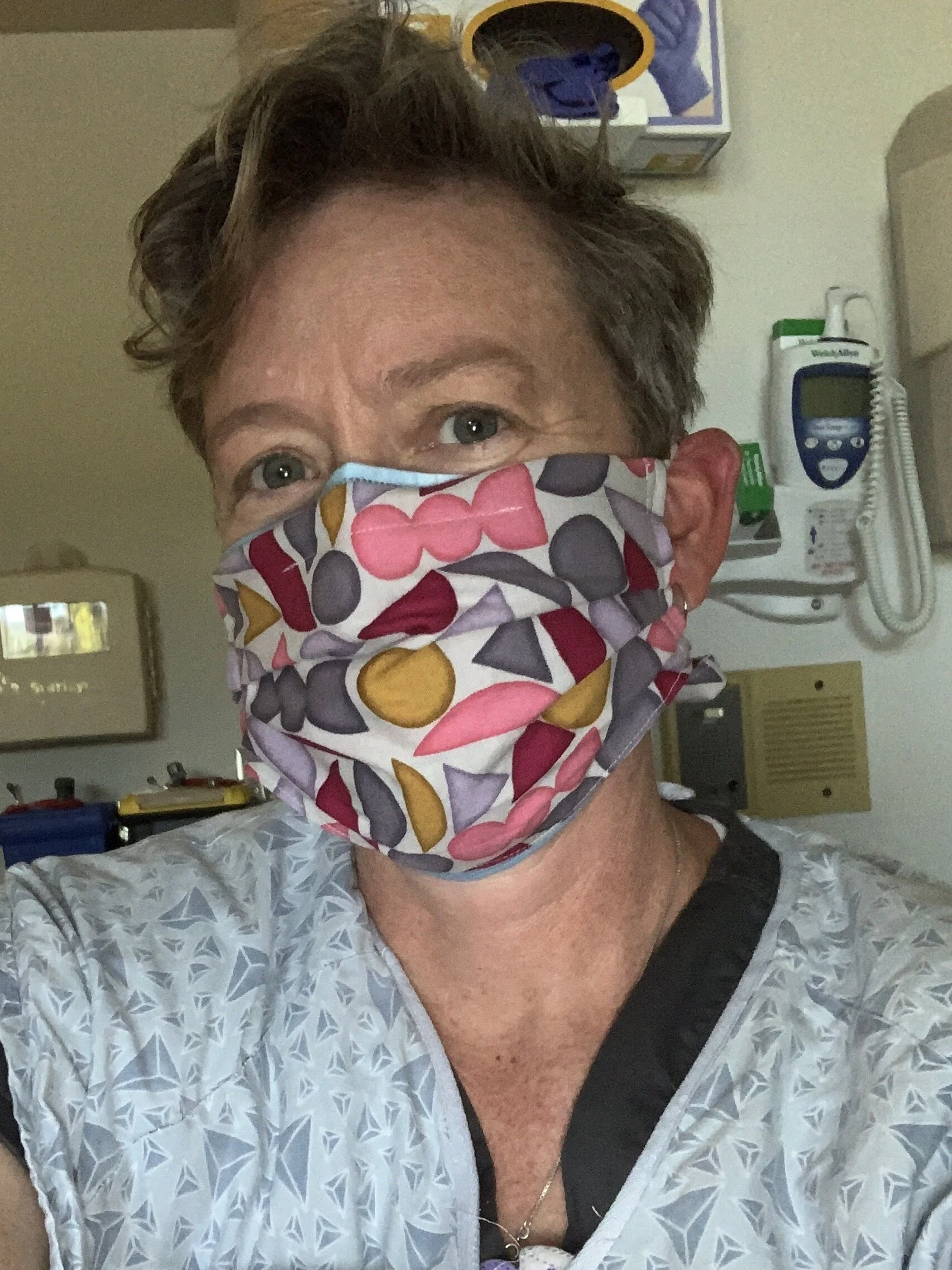 cloth mask over surgical mask in NICU