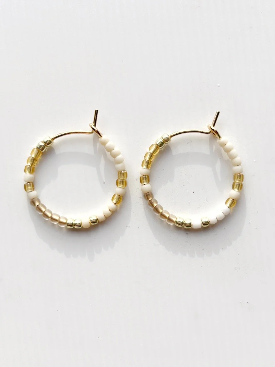 MINI beaded hoop earrings // cream + white