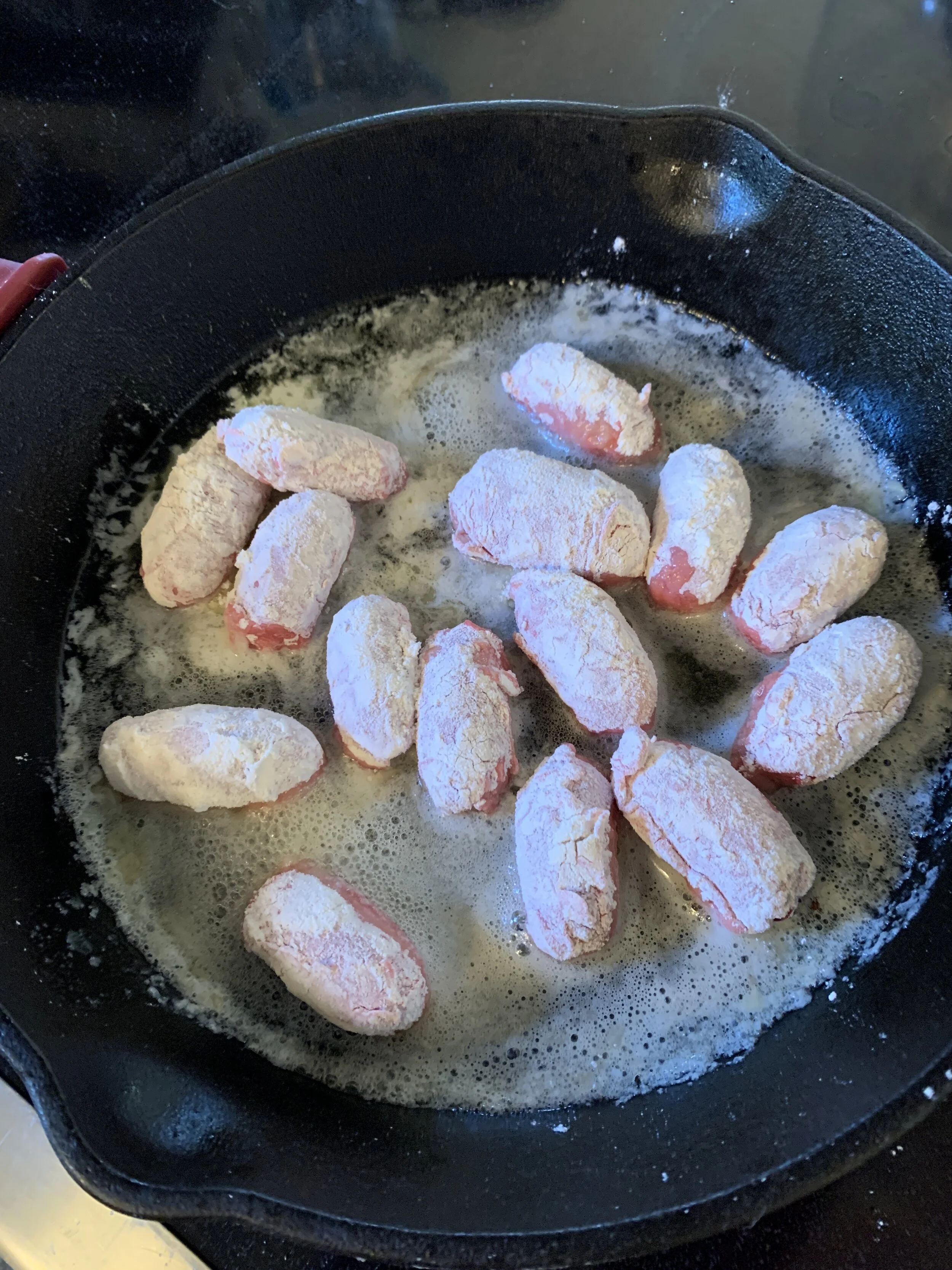 Calf fries in skillet and Flour.JPG