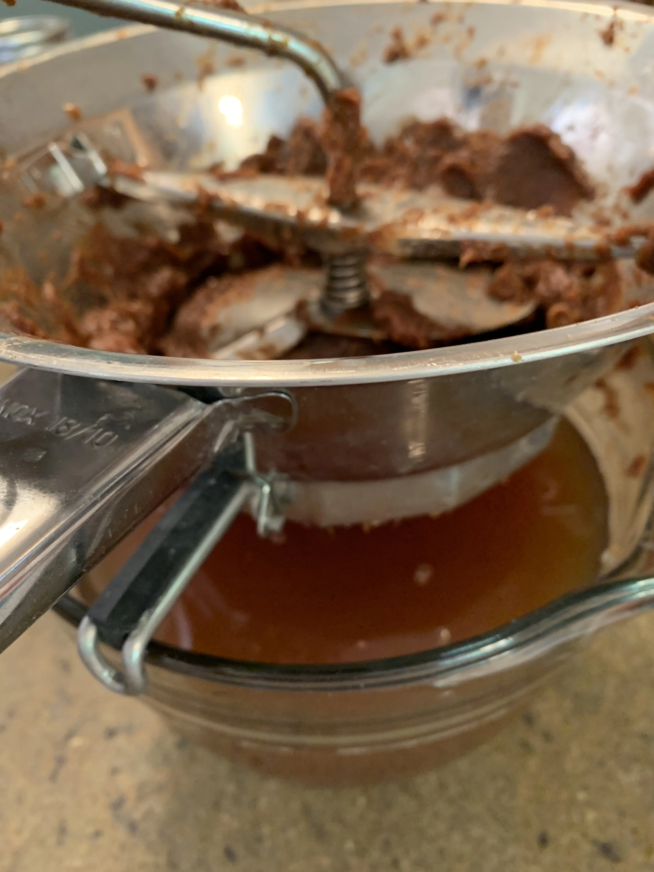 Tamarind in strainer & juicer.JPG