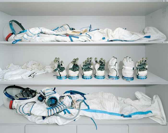 A Sokol suit with several different sized gloves, in storage at Yuri Gagarin Cosmonaut Training Centre.
