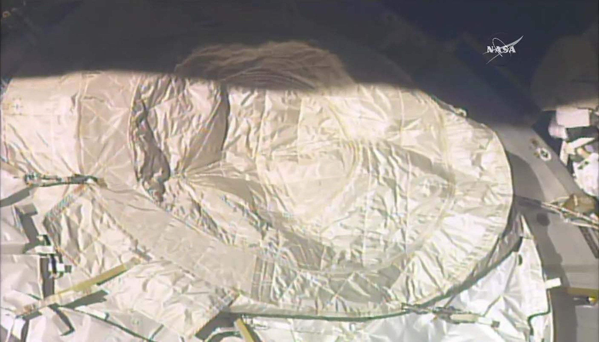 An on-orbit view of the PMA cover in place.
