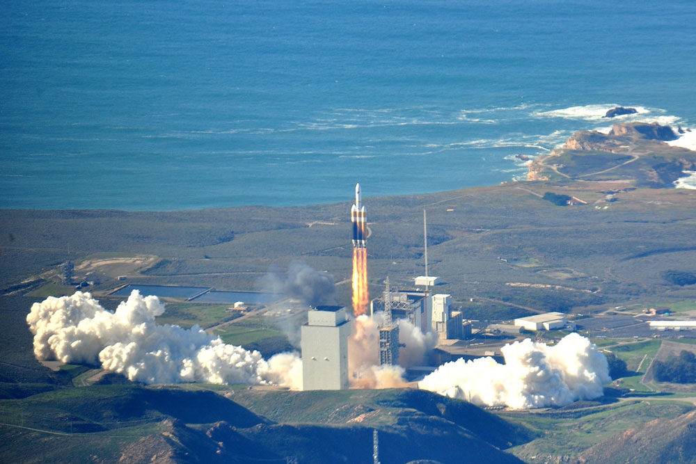 A Delta IV Heavy lifts off from Vandenberg