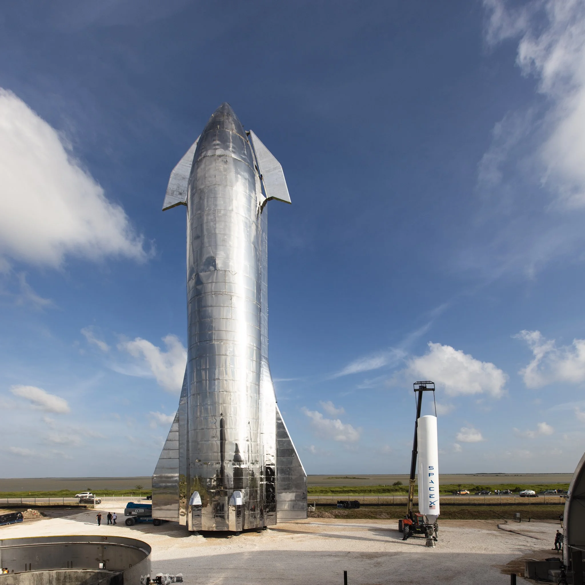 Starship next to Falcon 1