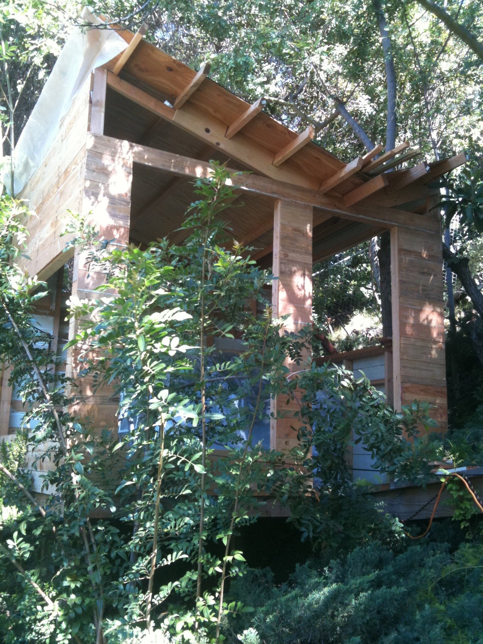 Los Angeles- Hillside Hutch- Reclaimed Lumber: deck, flooring, studs, windows, rafters, door 