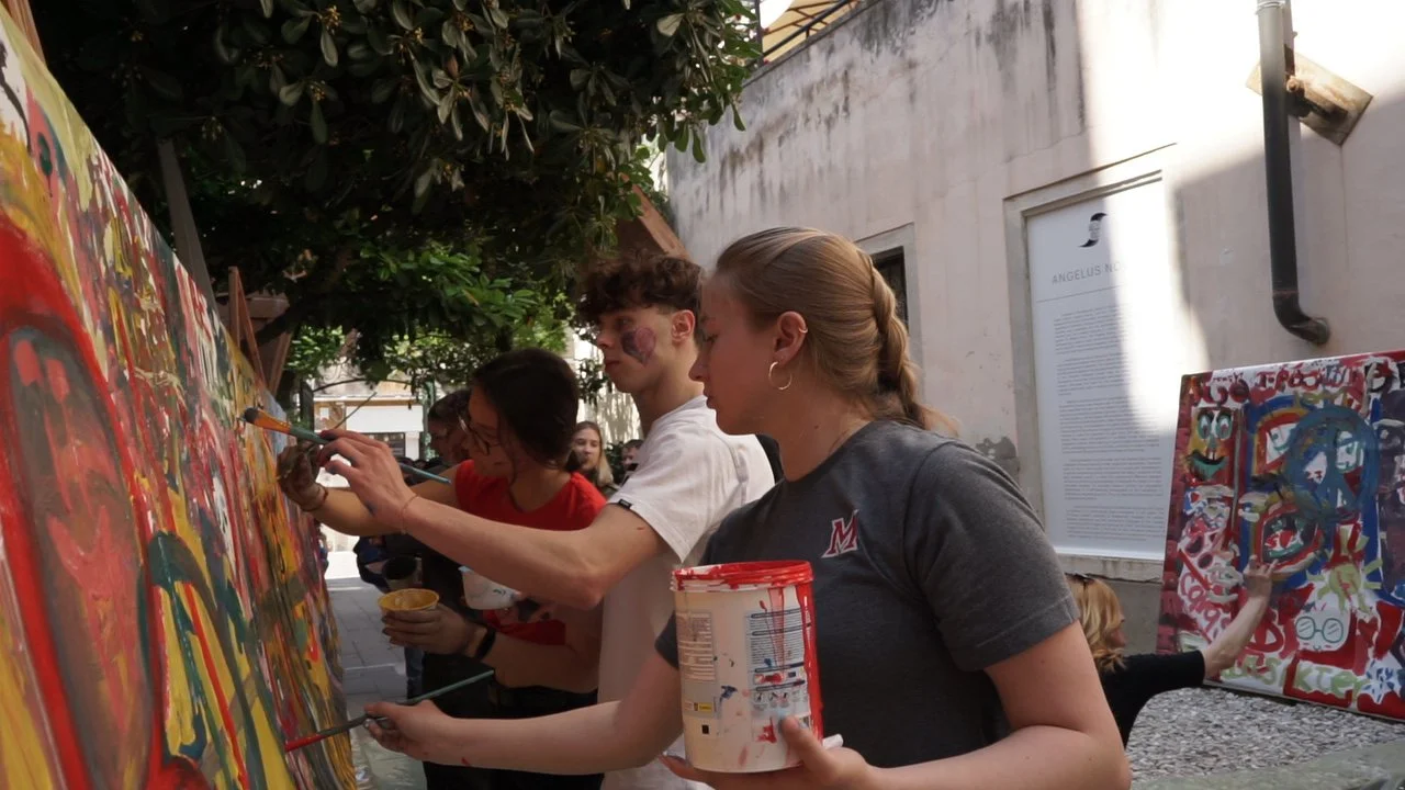 KAYLA HELPINGPAINT.JPG