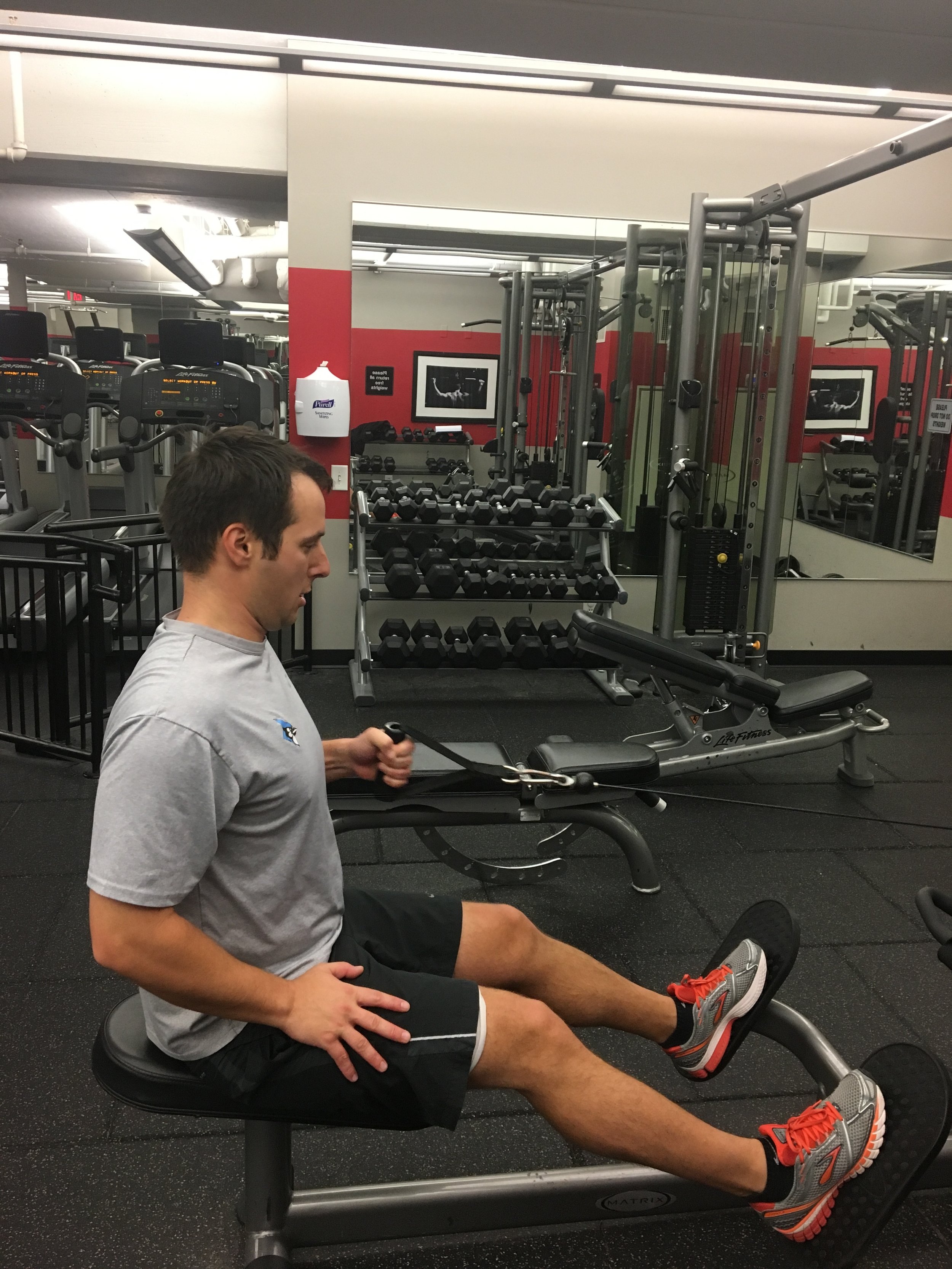 Shaun Single arm seated rows.JPG