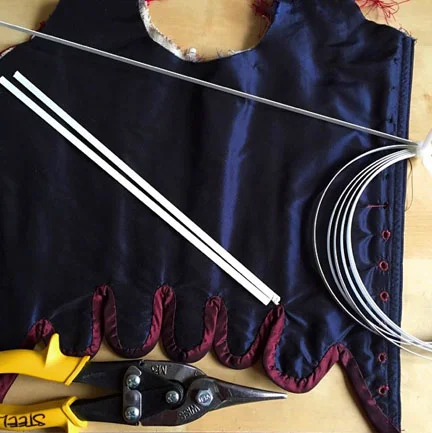 Cutting metal boning for a silk corset