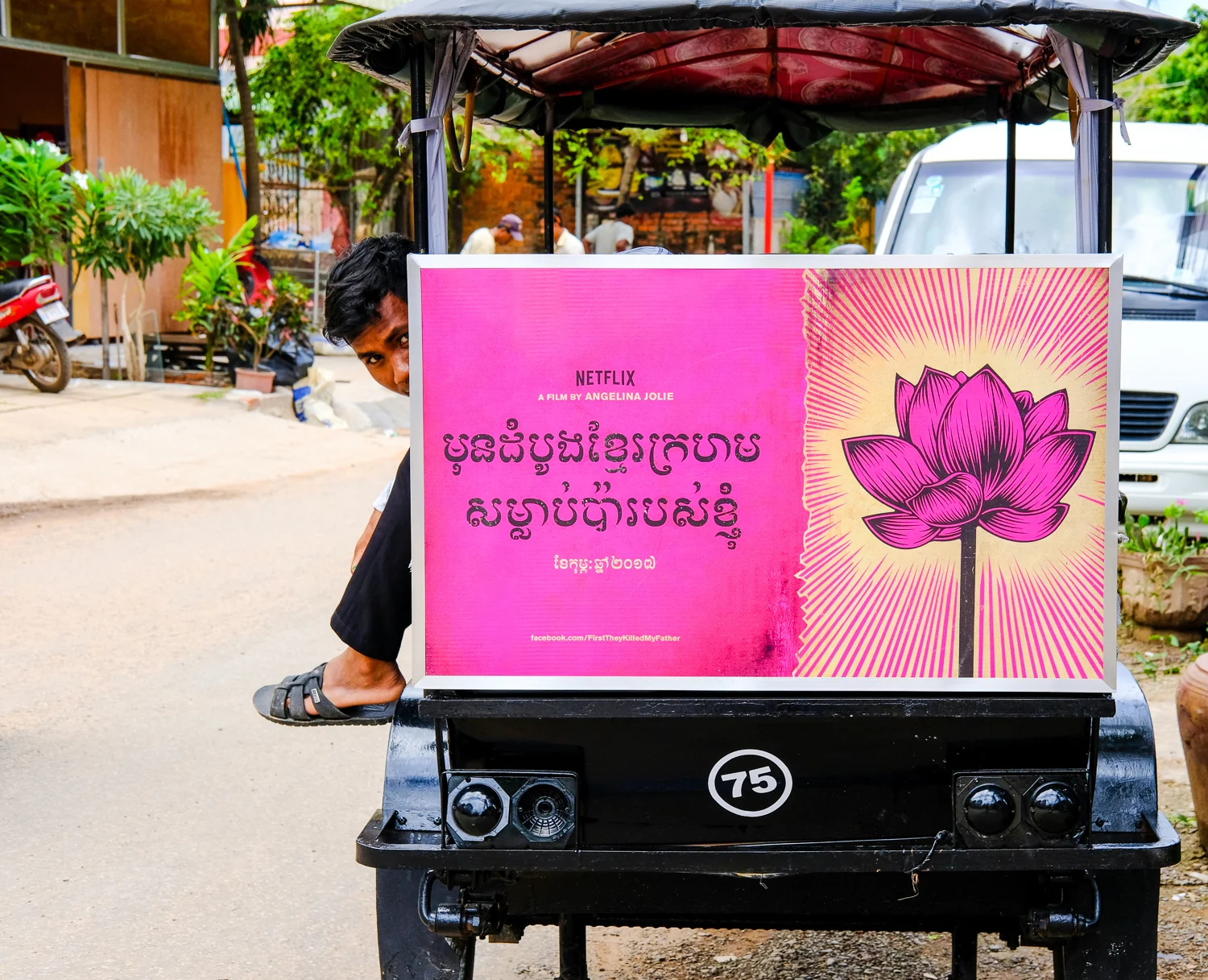 valerie-caro_cambodia_man-in-tuktuk.jpg