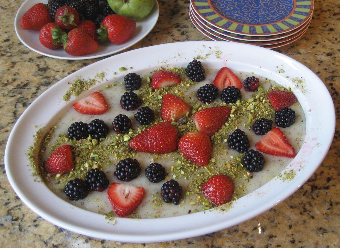 Firnee with fruit and pistachios