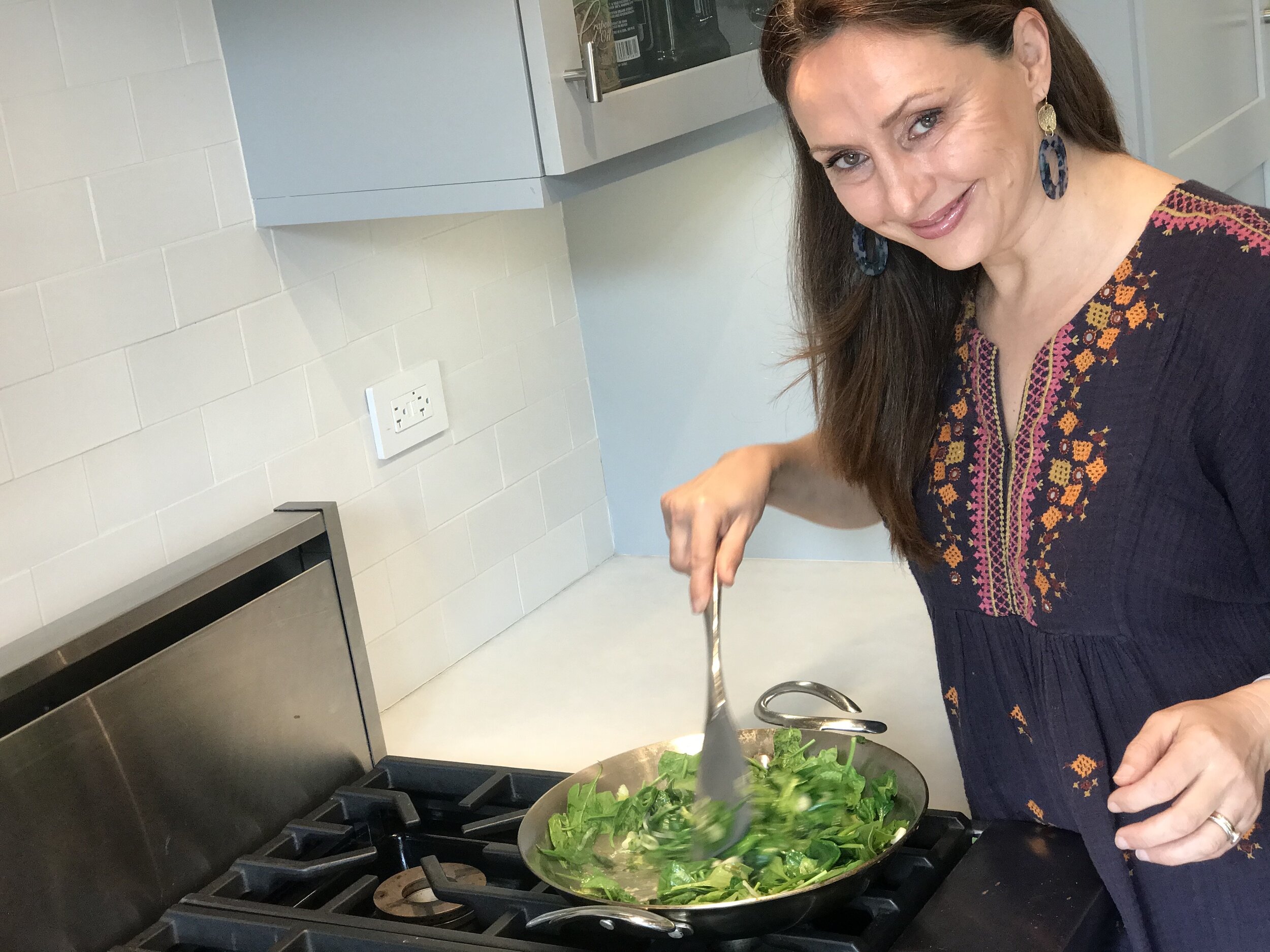 Saute’ spinach and green onions