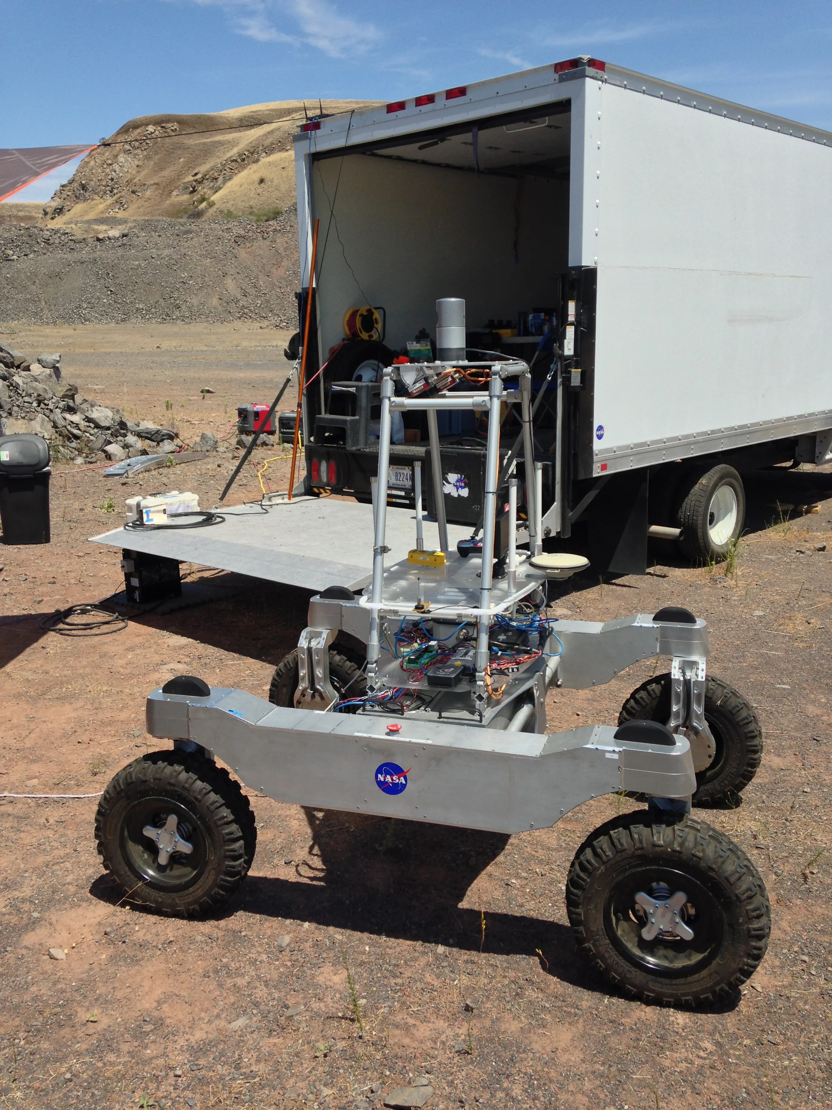 Designed and built in 2013 for NASA Ames Research Center. Custom electric wheel drives, four wheel steering and averaged suspension. First field test, Basalt Hills CA, July 2014