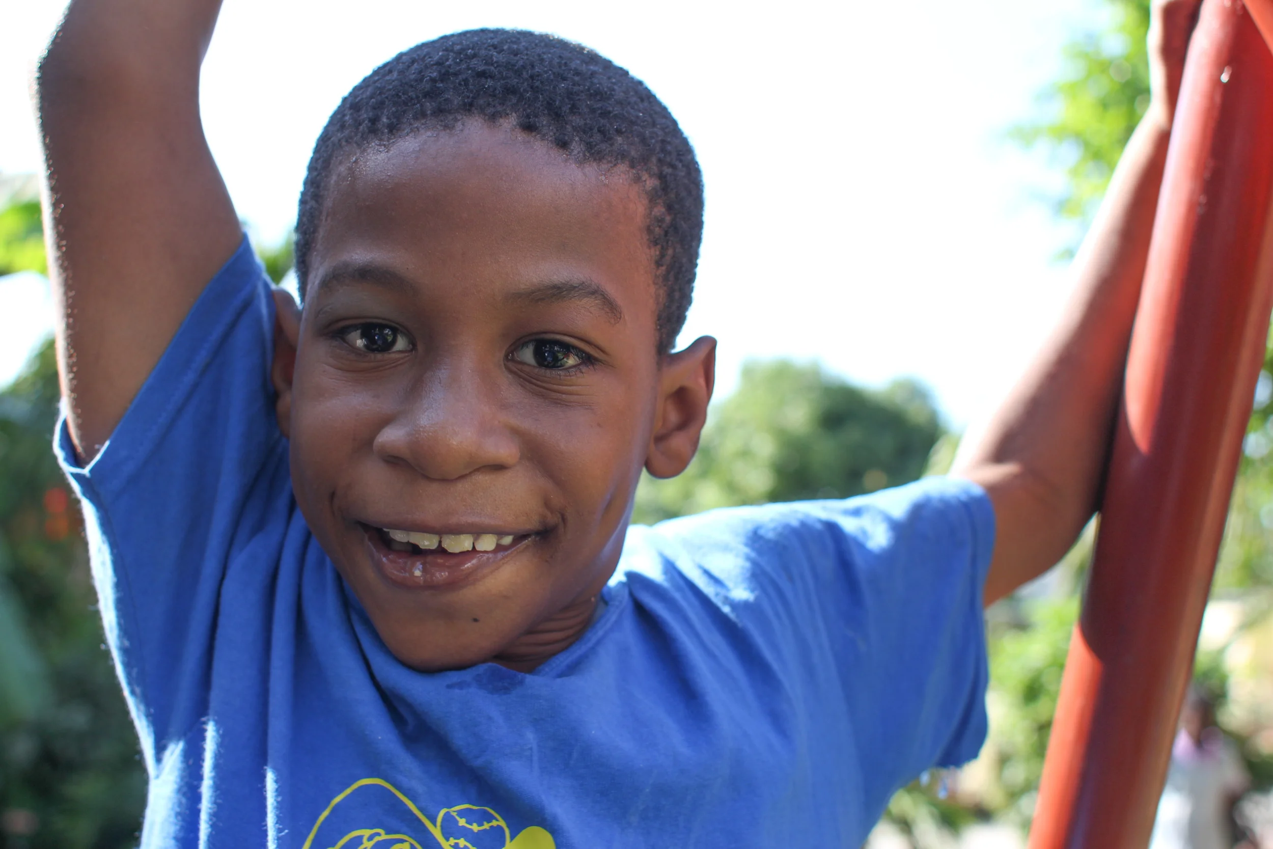 I can't remember this boy's name. He couldn't speak, but he had a blast climbing all over the swing set.